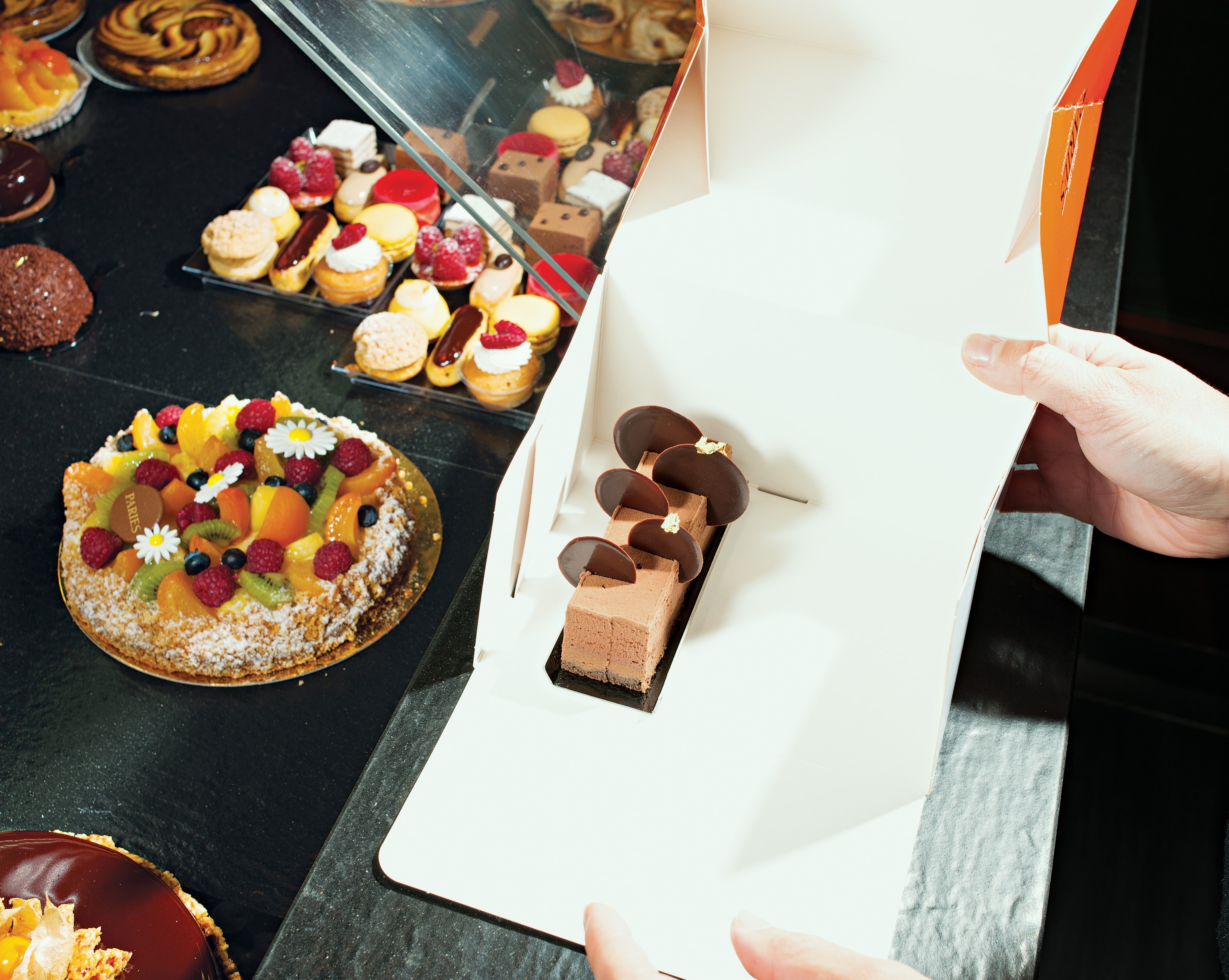 a slice of a decadent confection from Maison Pariès in Bayonne, France