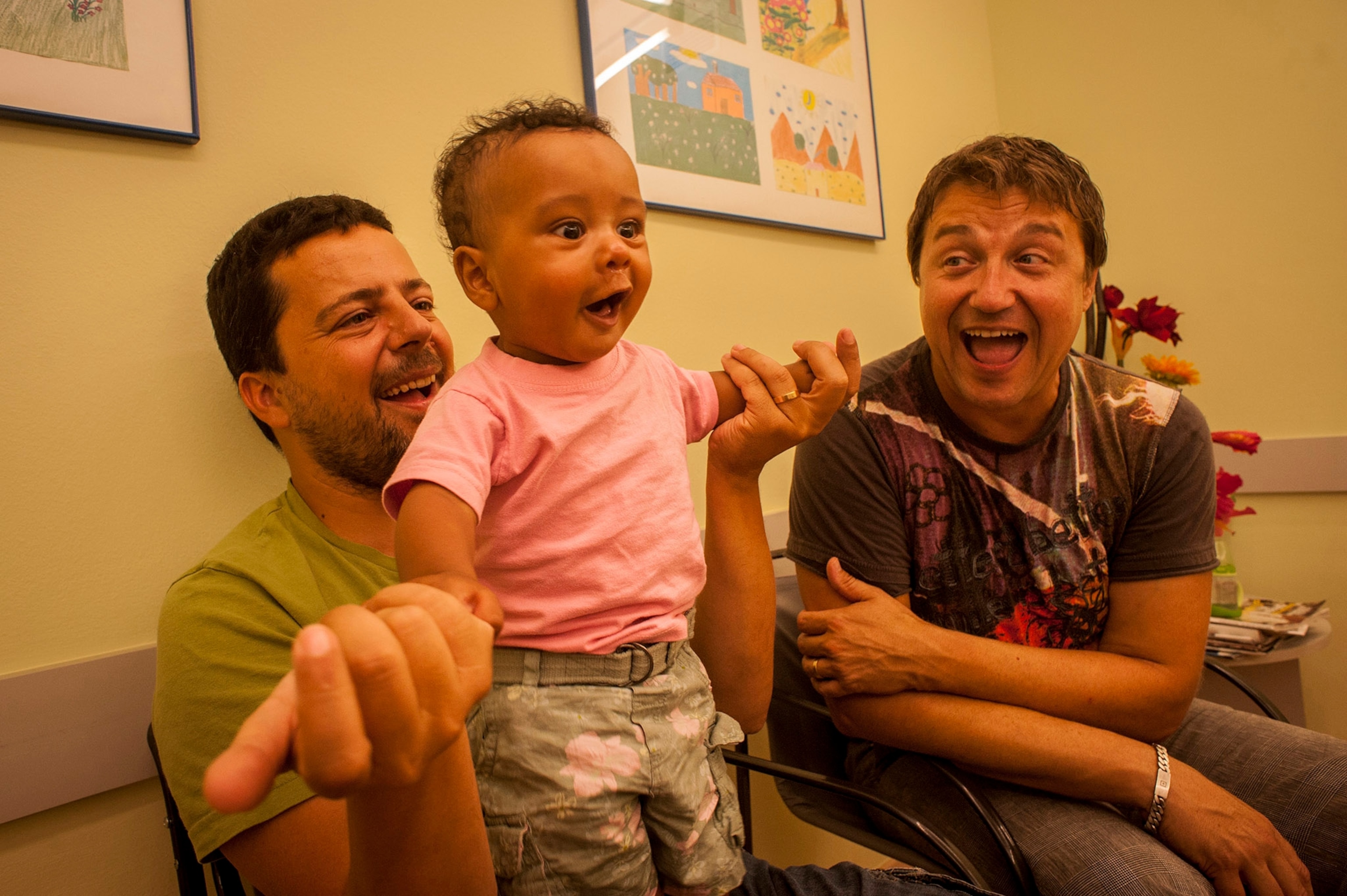 two fathers and their adopted son