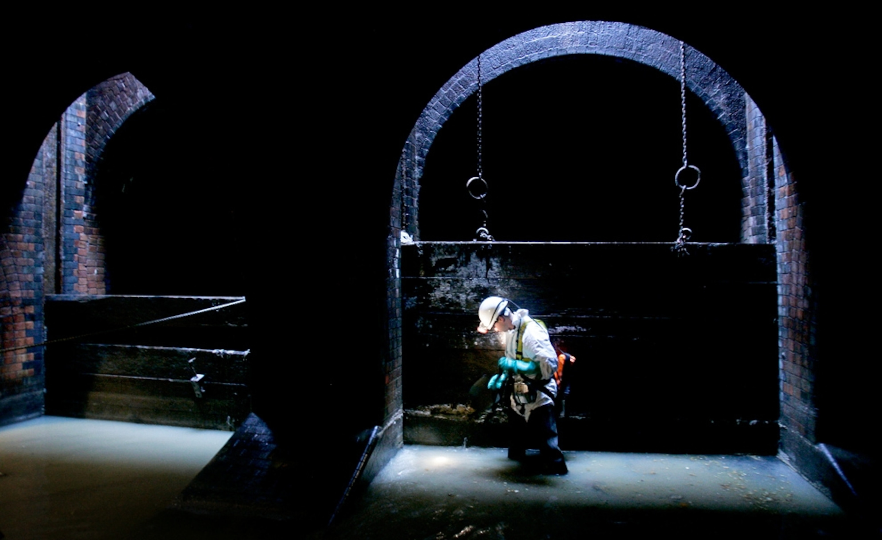 fat removal by a "flusher" in the London sewers, where a massive clog was found in Leicester Square in 2010