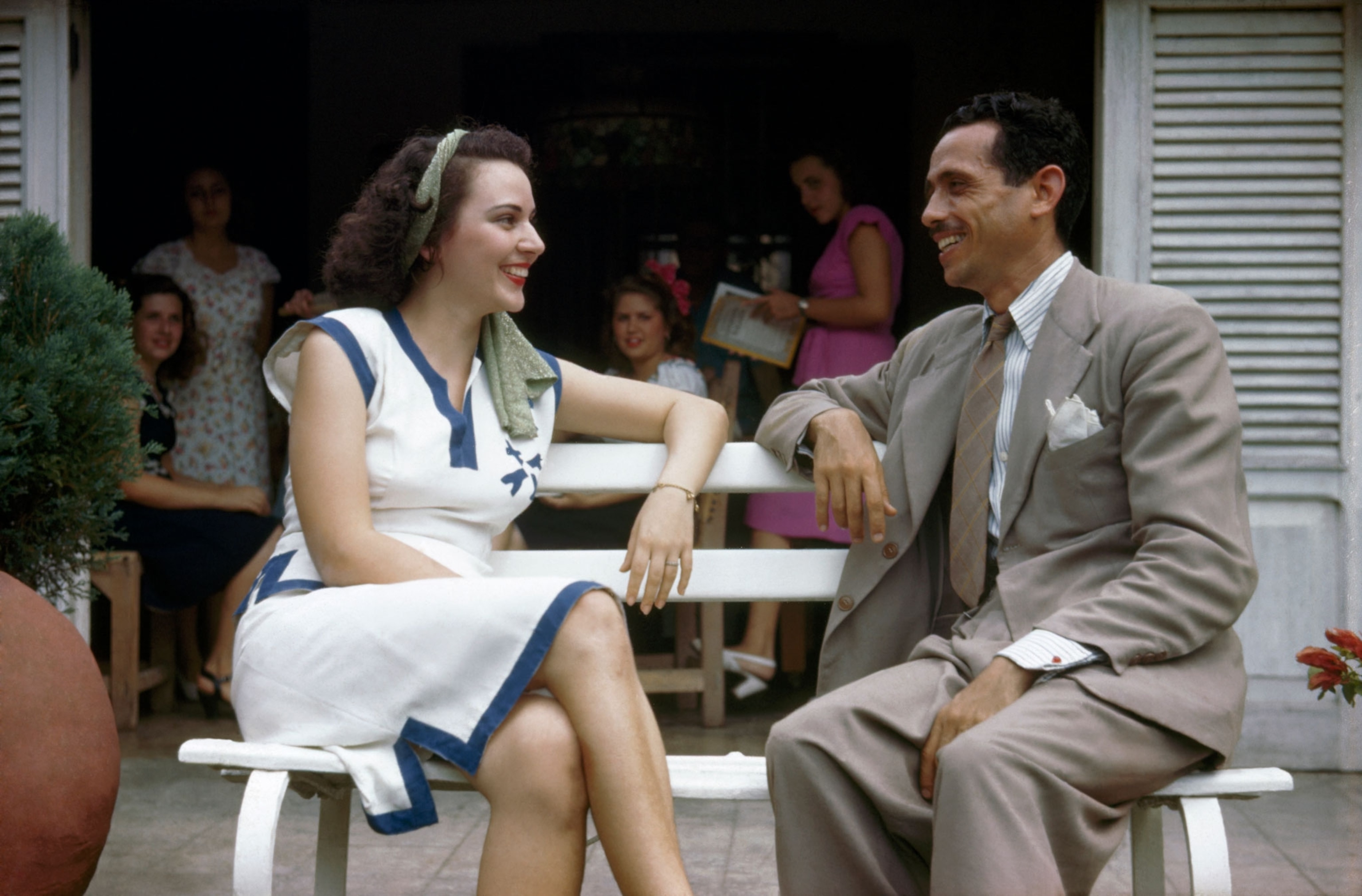 a man and a woman talking in Cuba