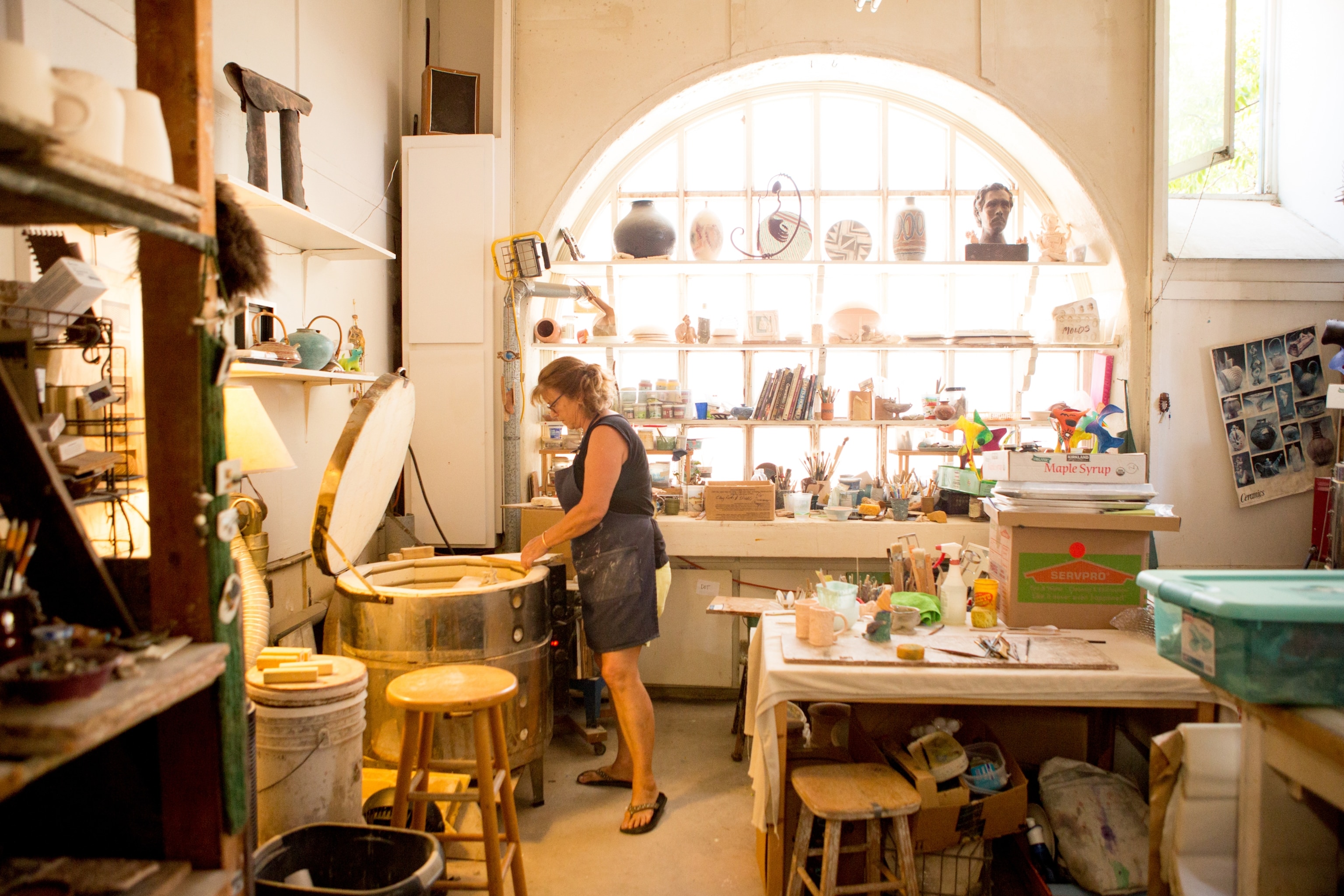 a local artisan in Balboa Park’s Spanish Village Art Center, San Diego CA