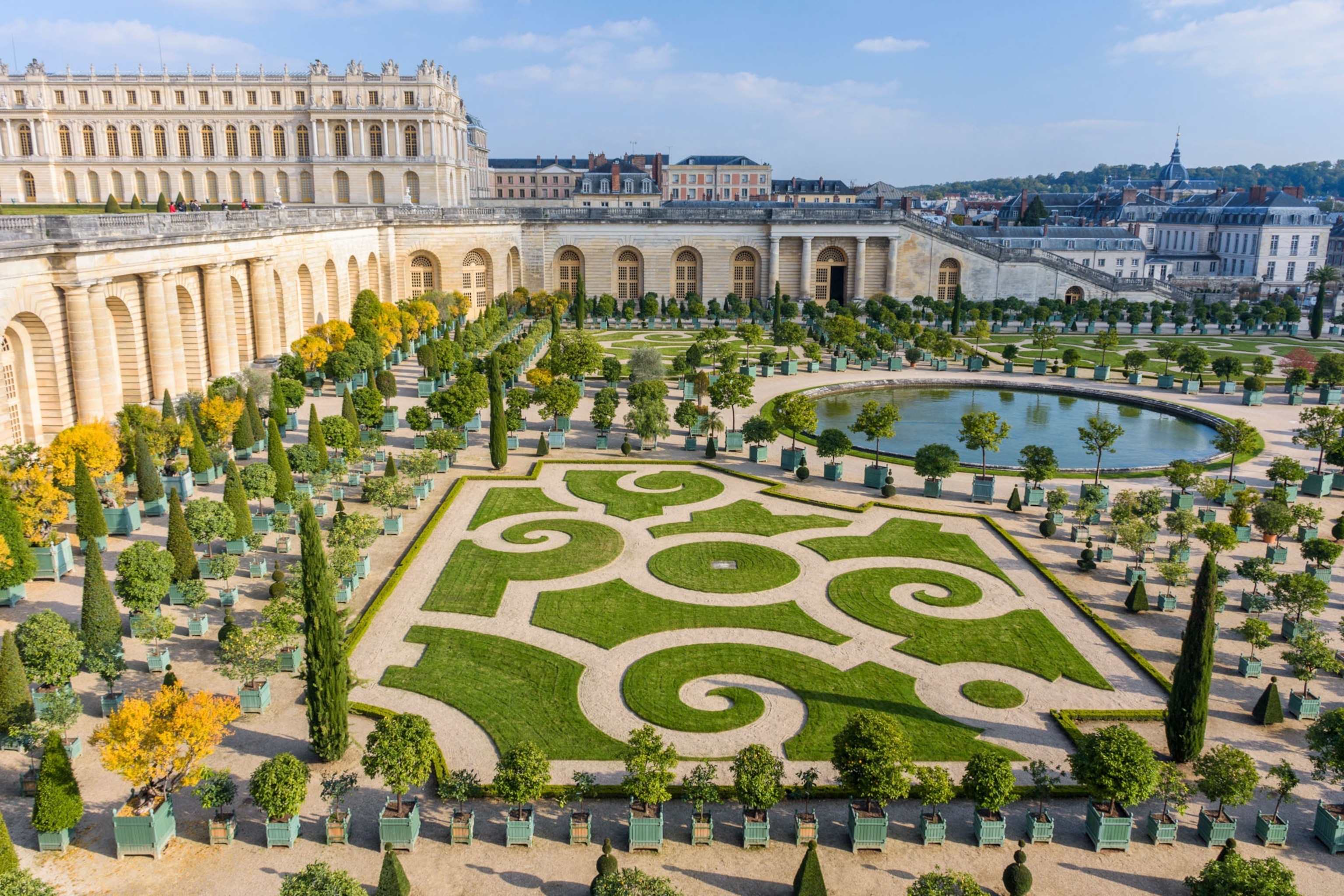 An aerial view of a palace garden.
