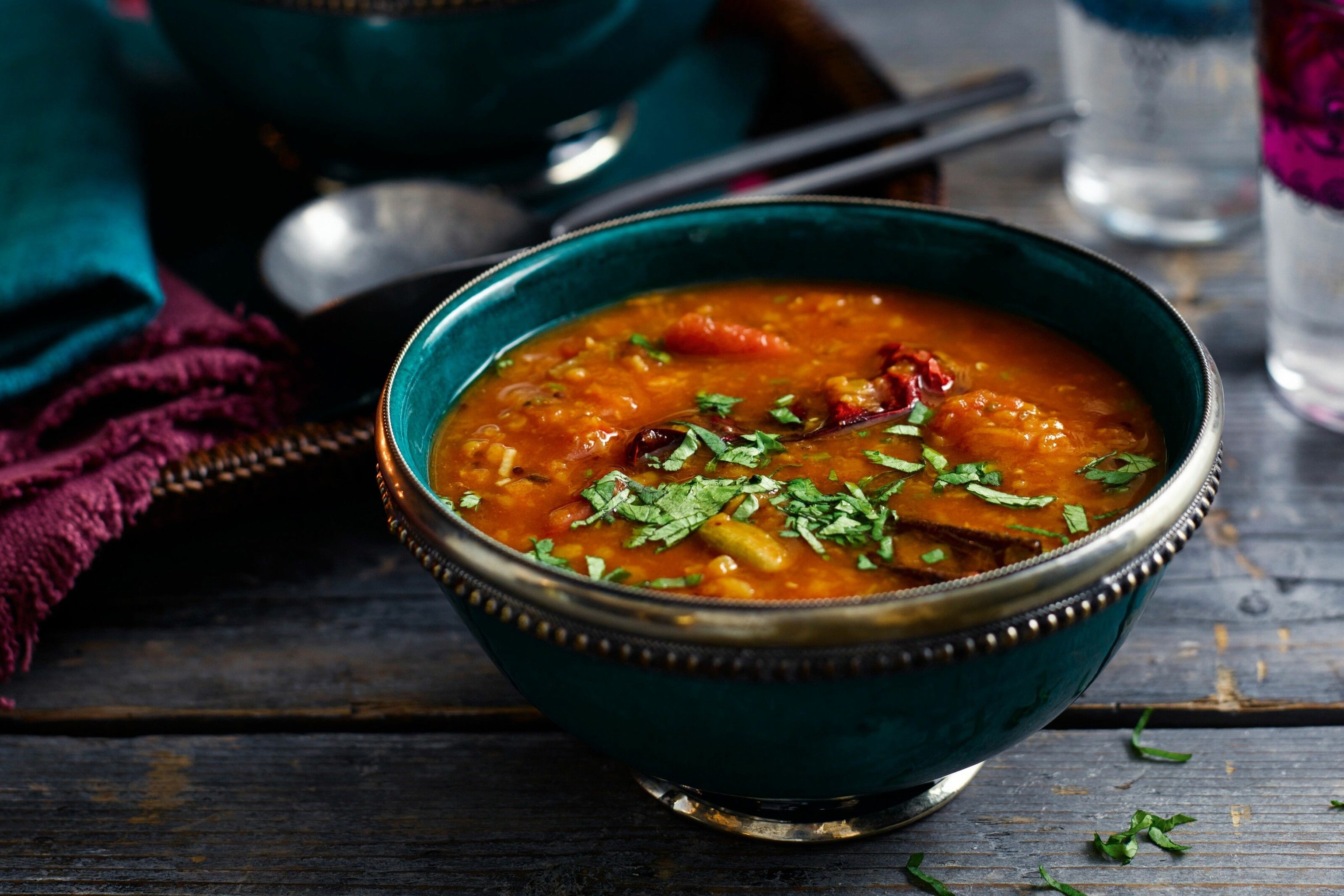 Rasam, a soup packed with tamarind, tomatoes and red lentils.