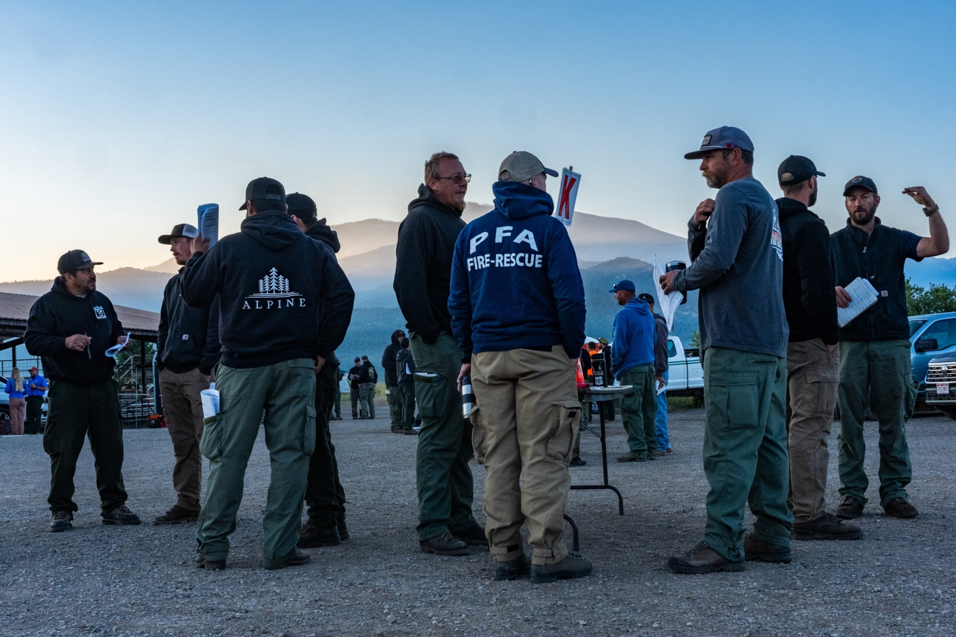 Morning meeting at Fire Camp at Ouray Fairgrounds.