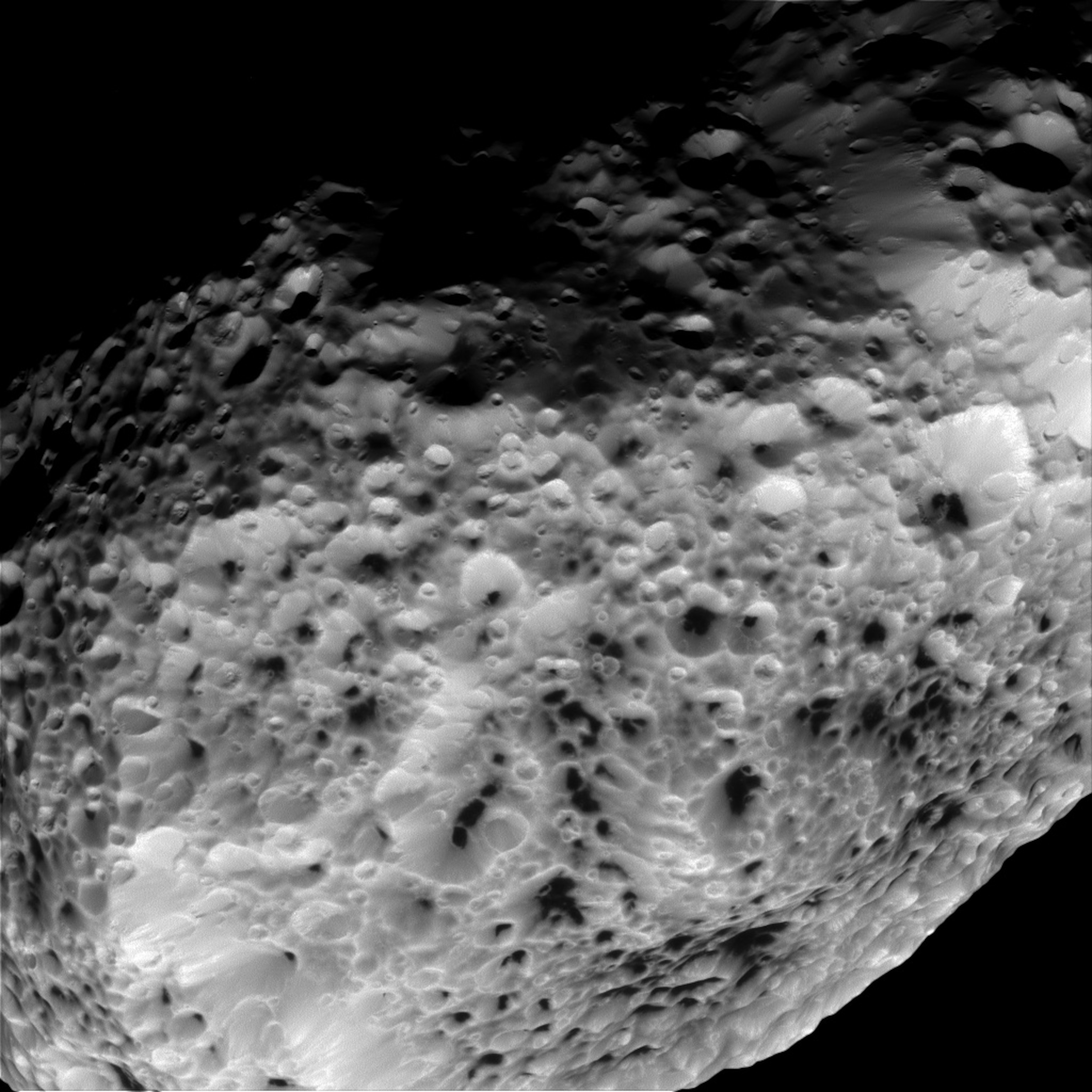 Hyperion's strangely pitted surface, seen in 2015. (NASA/JPL/Caltech)