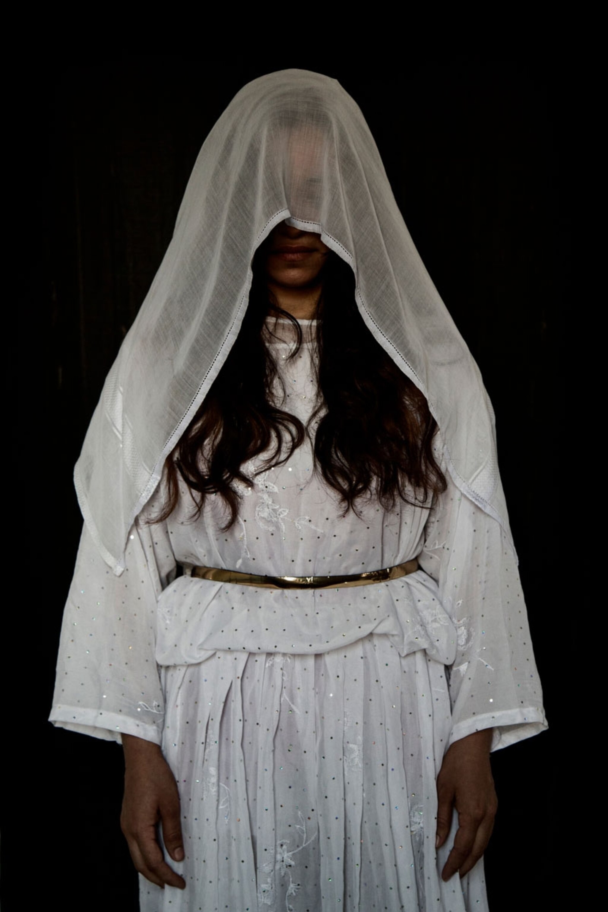 a Yazidi woman who was held as a slave by ISIS