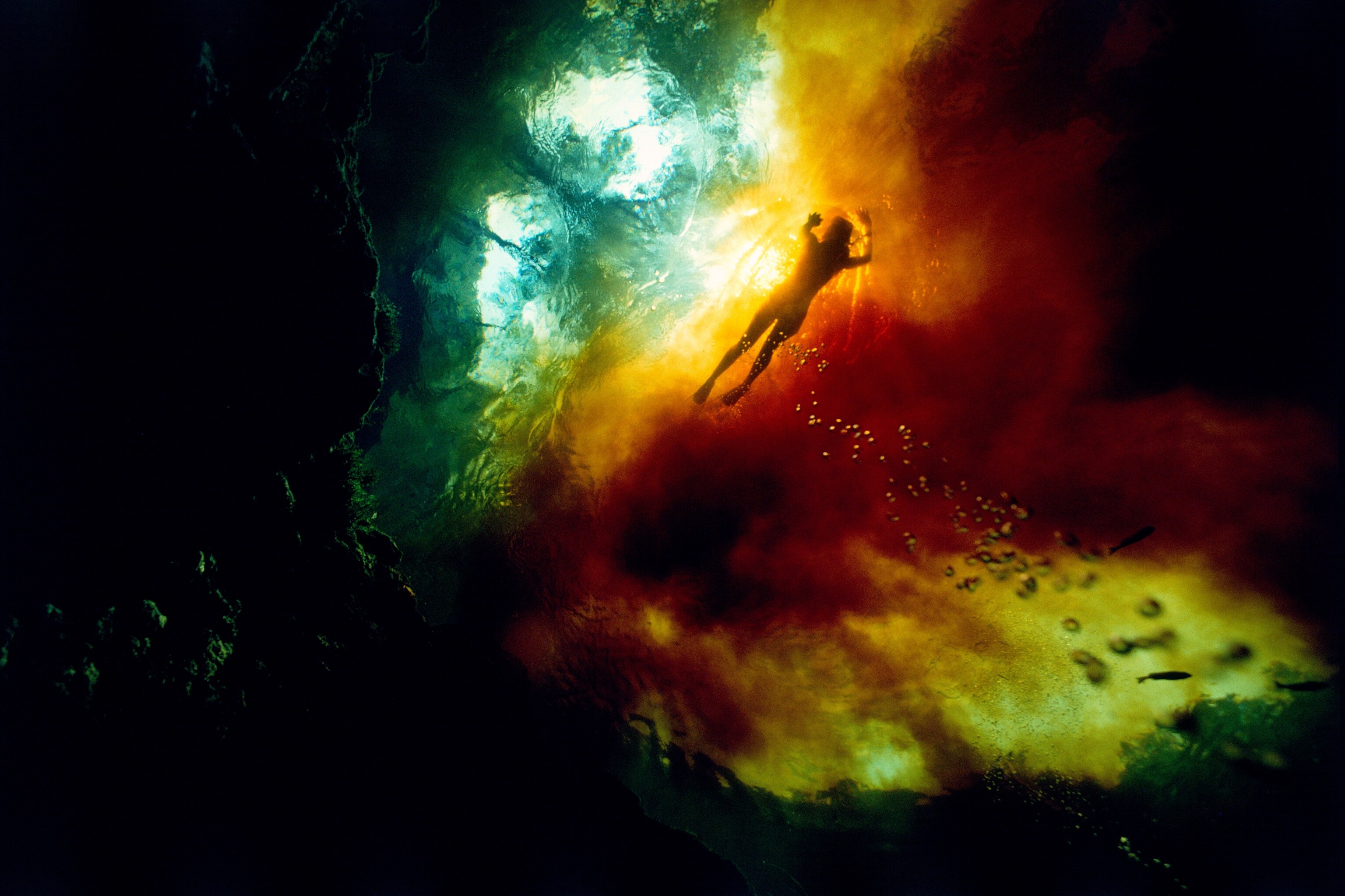 a person swimming in Santa Fe river