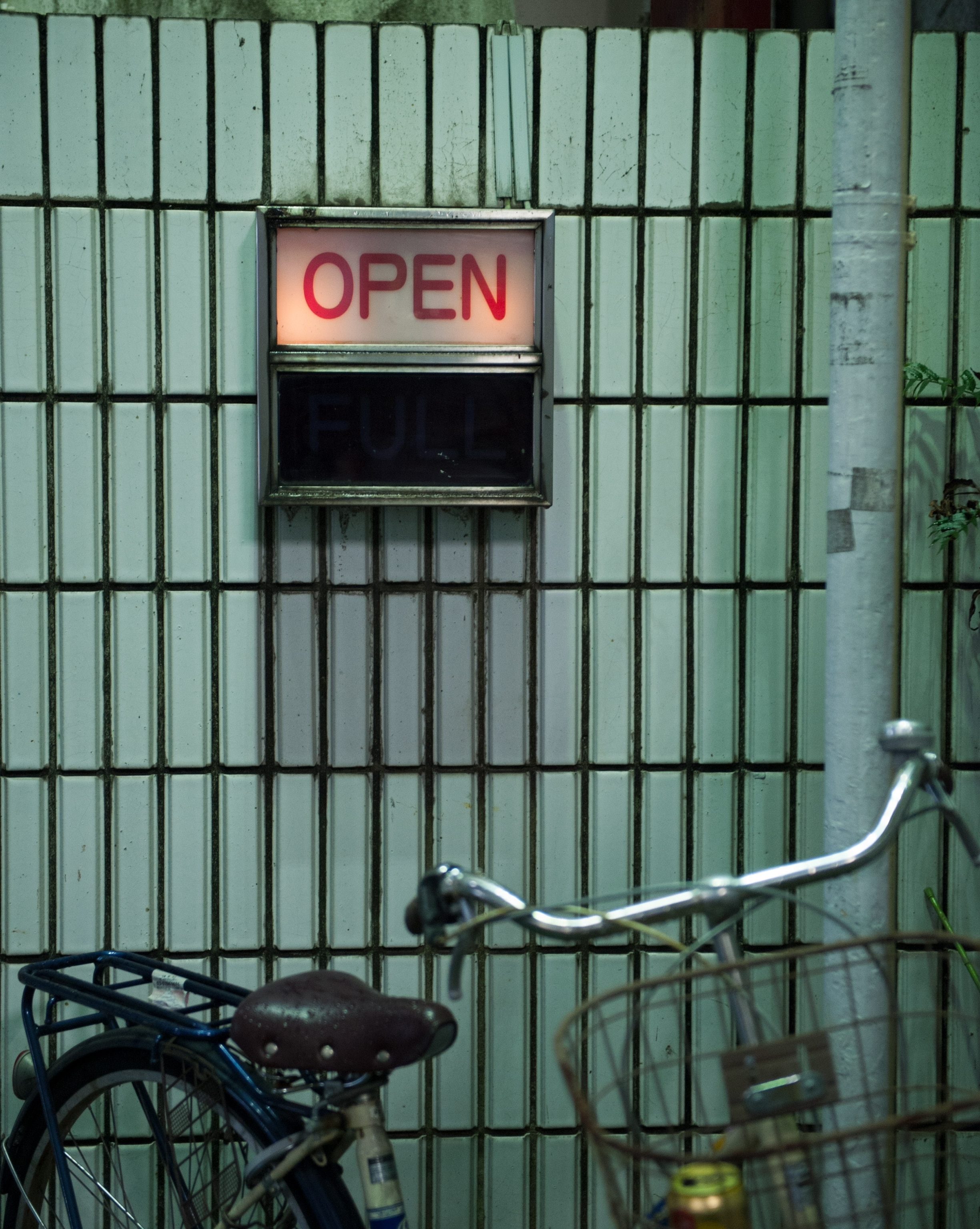 a bike in the love hotel district in Tokyo, Japan