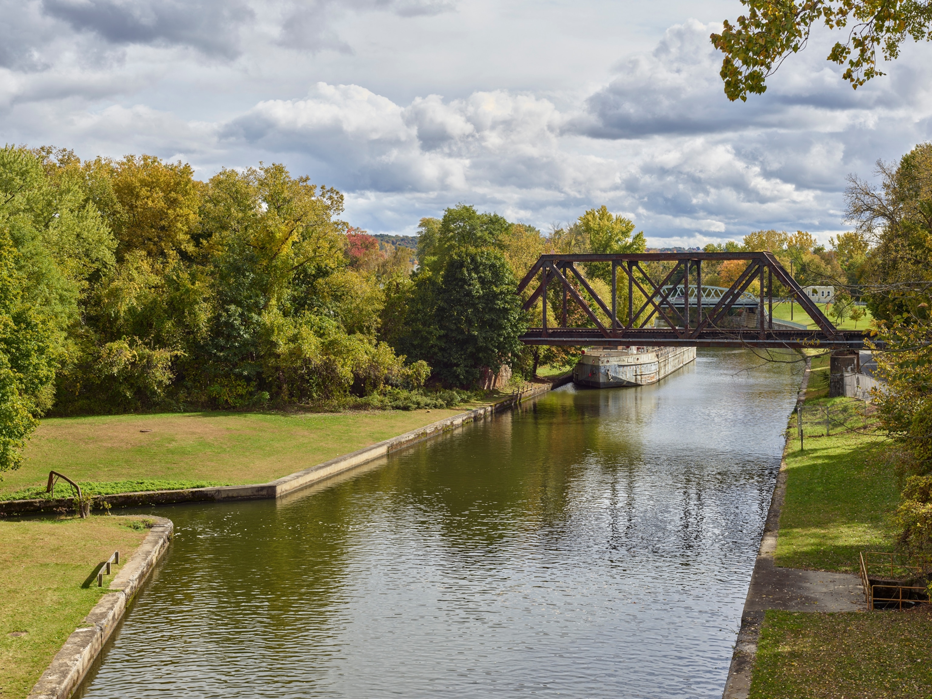 View from Lock E3 looking toward Lock E2 in Waterford; MV Day Peckinpaugh moored at wall, Erie Canal, New York.