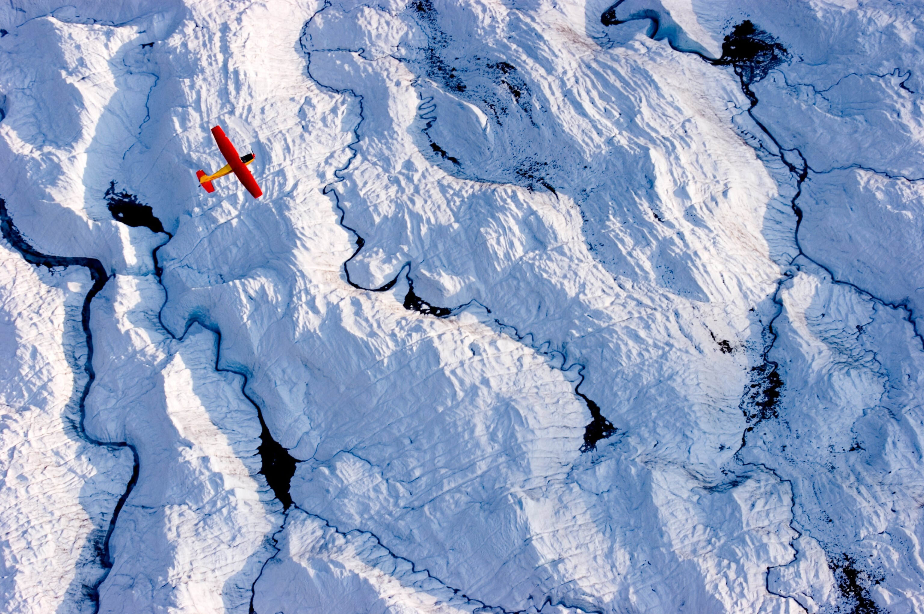 plane over glacier in Wrangell-St. Elias National Park, Alaska