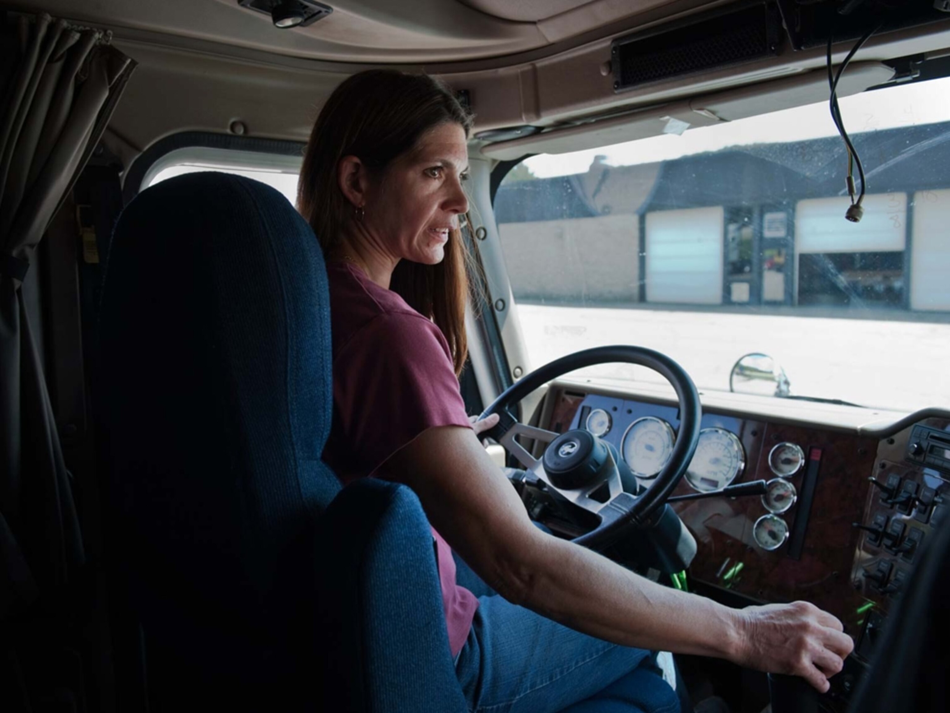 Lee Zavislak behind the wheel of a truck at the Western Area Career and Technology Center in Canonsburg, Pennsylvania.