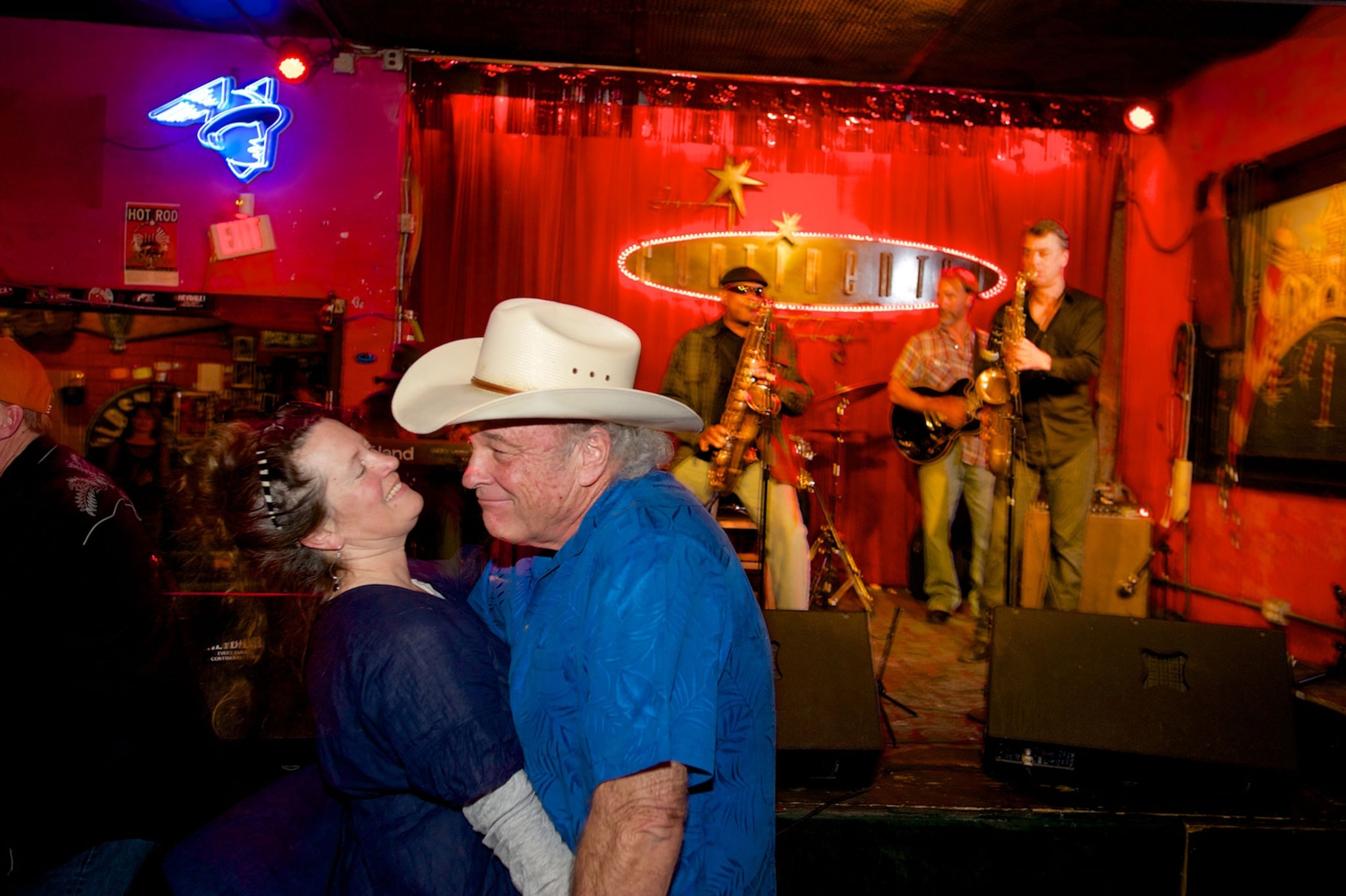 a couple dancing to country music in the continental club