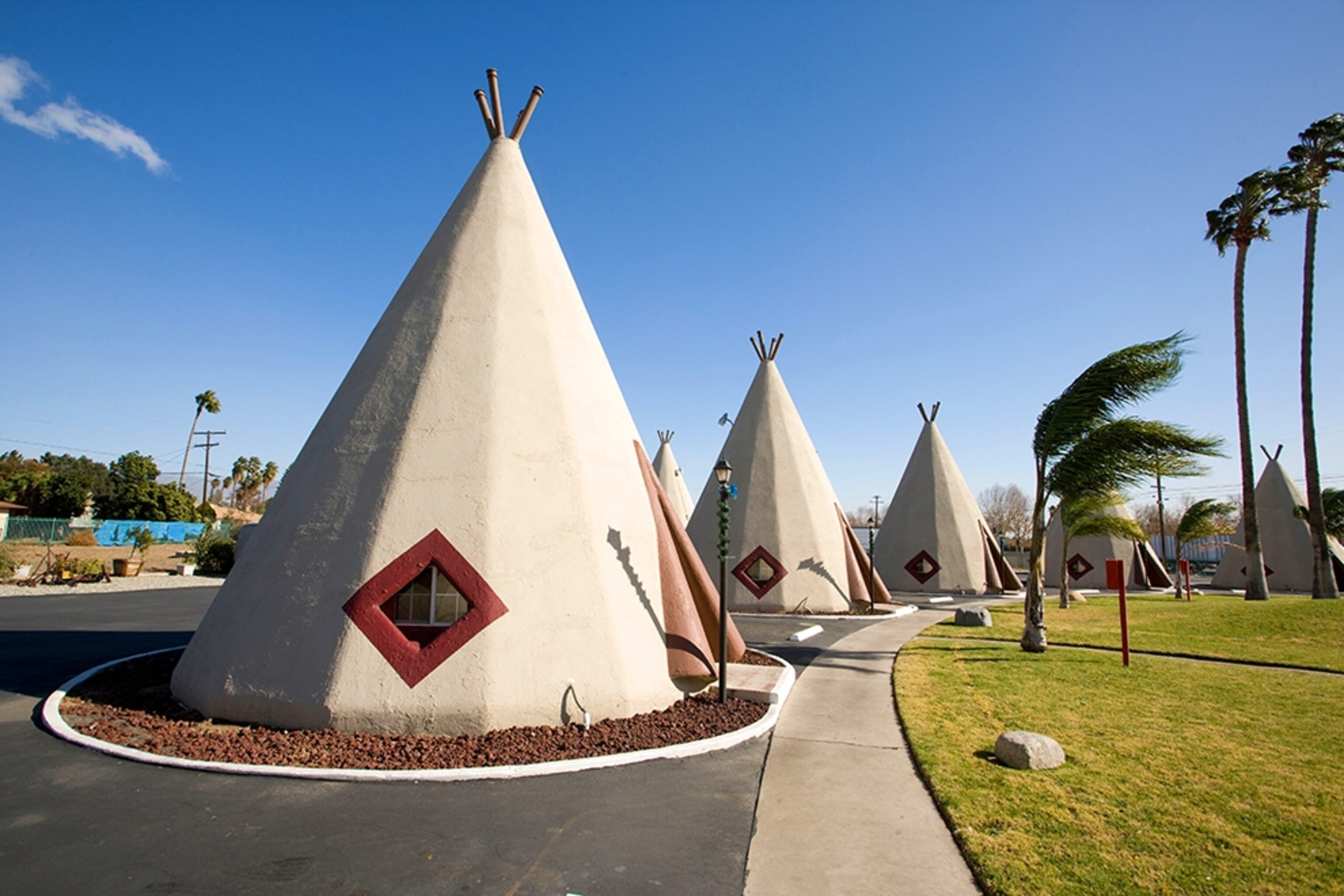 tepee-shaped motel rooms at Wigwam Motel in Rialto, California