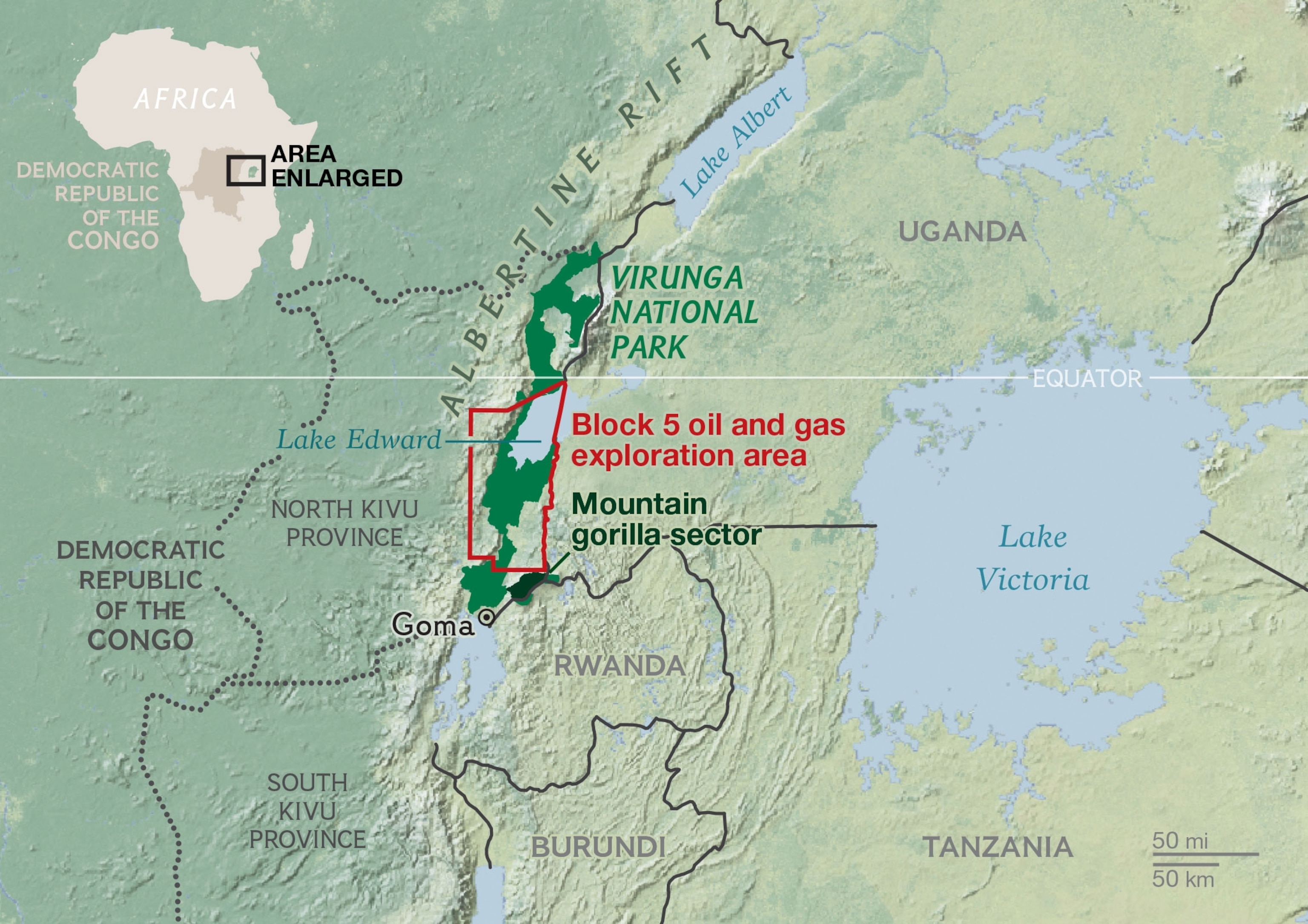 a Virunga park ranger sitting with a pair of gorillas.