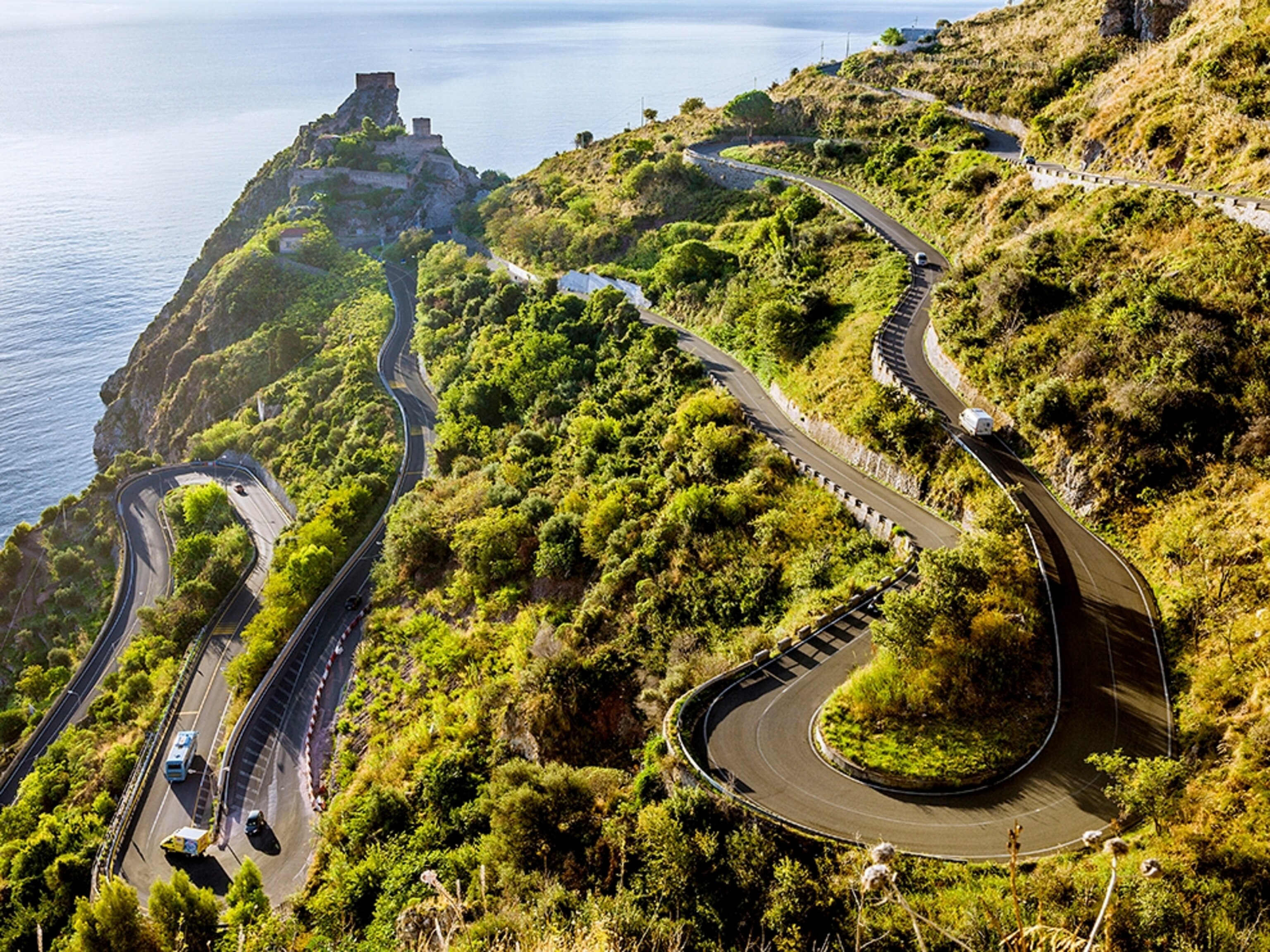 a curvy roadway in Sicily, Italy