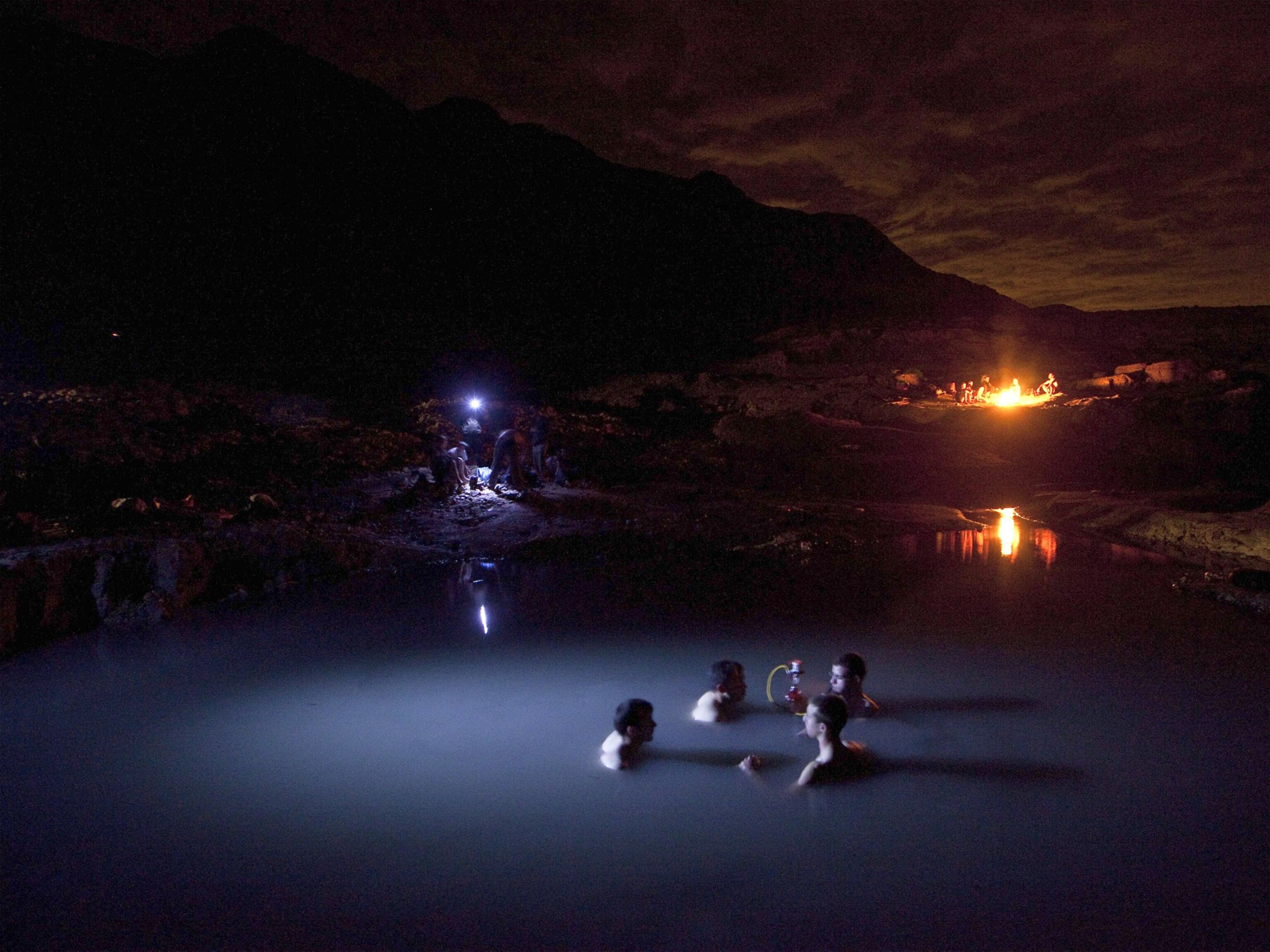 bathers in a hot spring in Israel waiting for Geminids