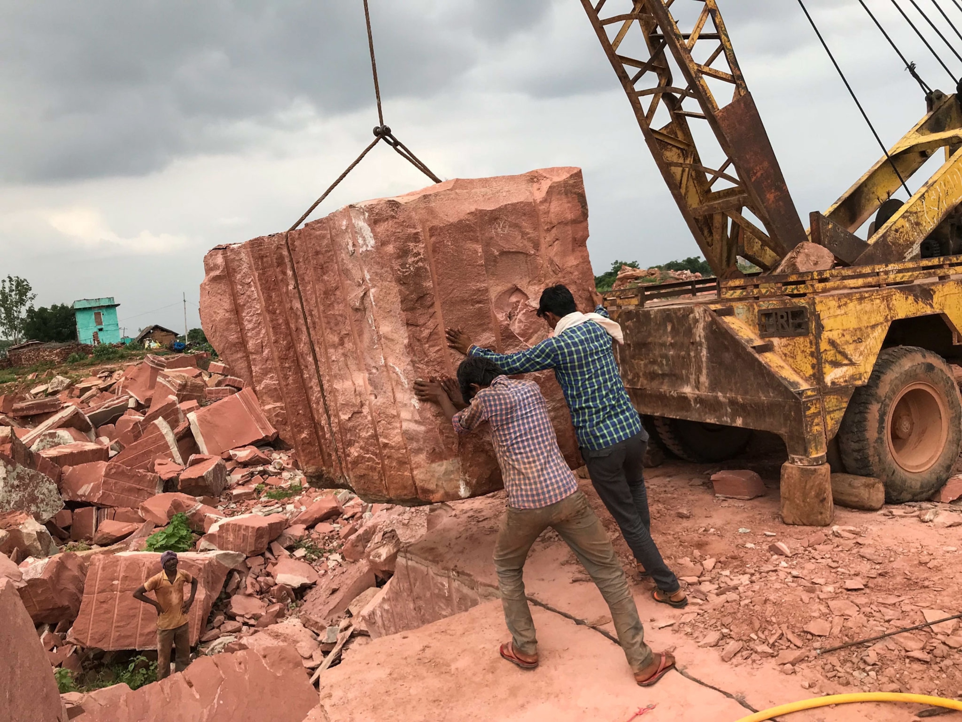 men working in a quarry in India