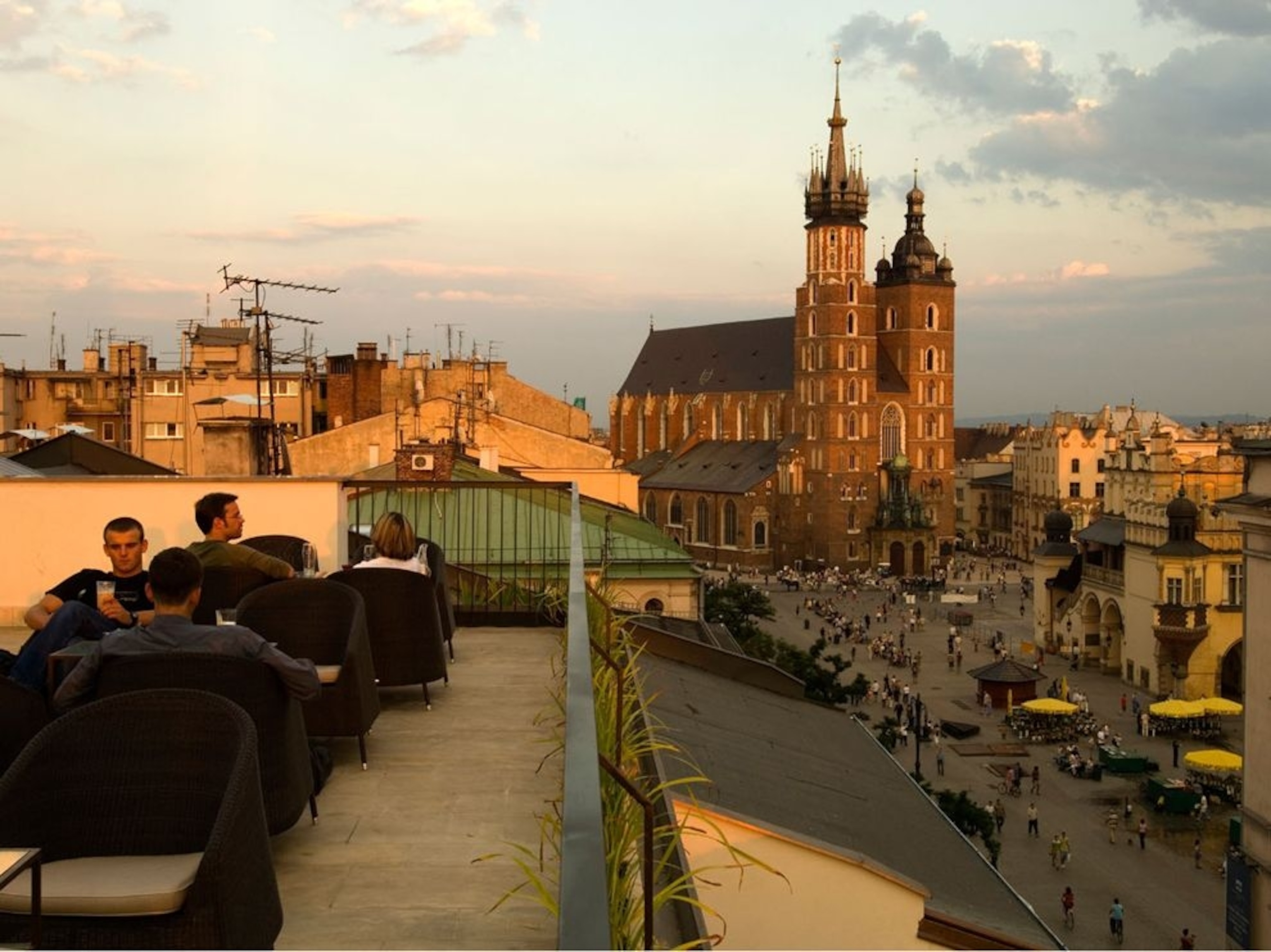 sun setting over a Polish city