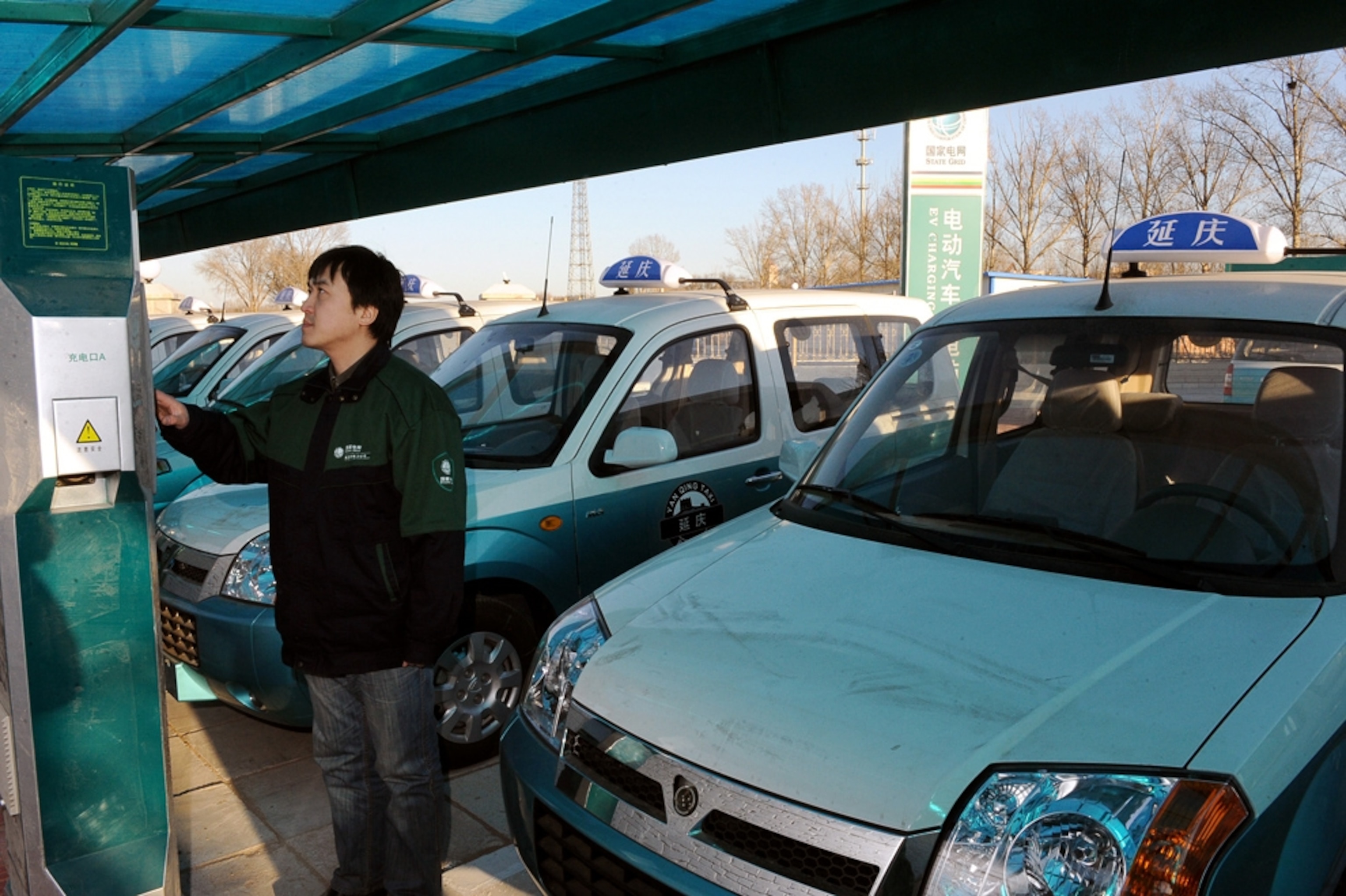 An electric taxi recharging station in Beijing, China.