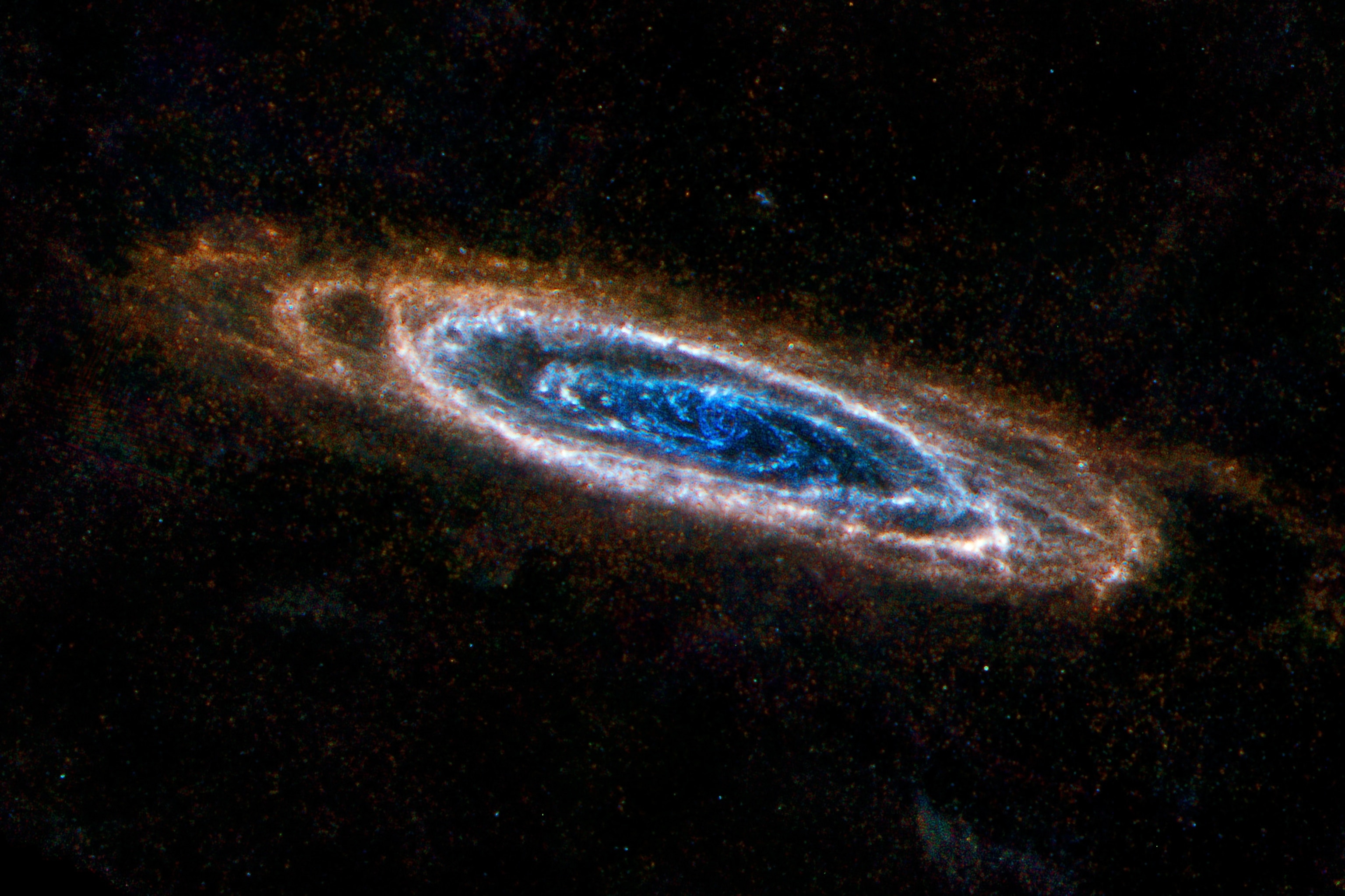 the Andromeda galaxy imaged by the European Space Agency’s observatory Herschel