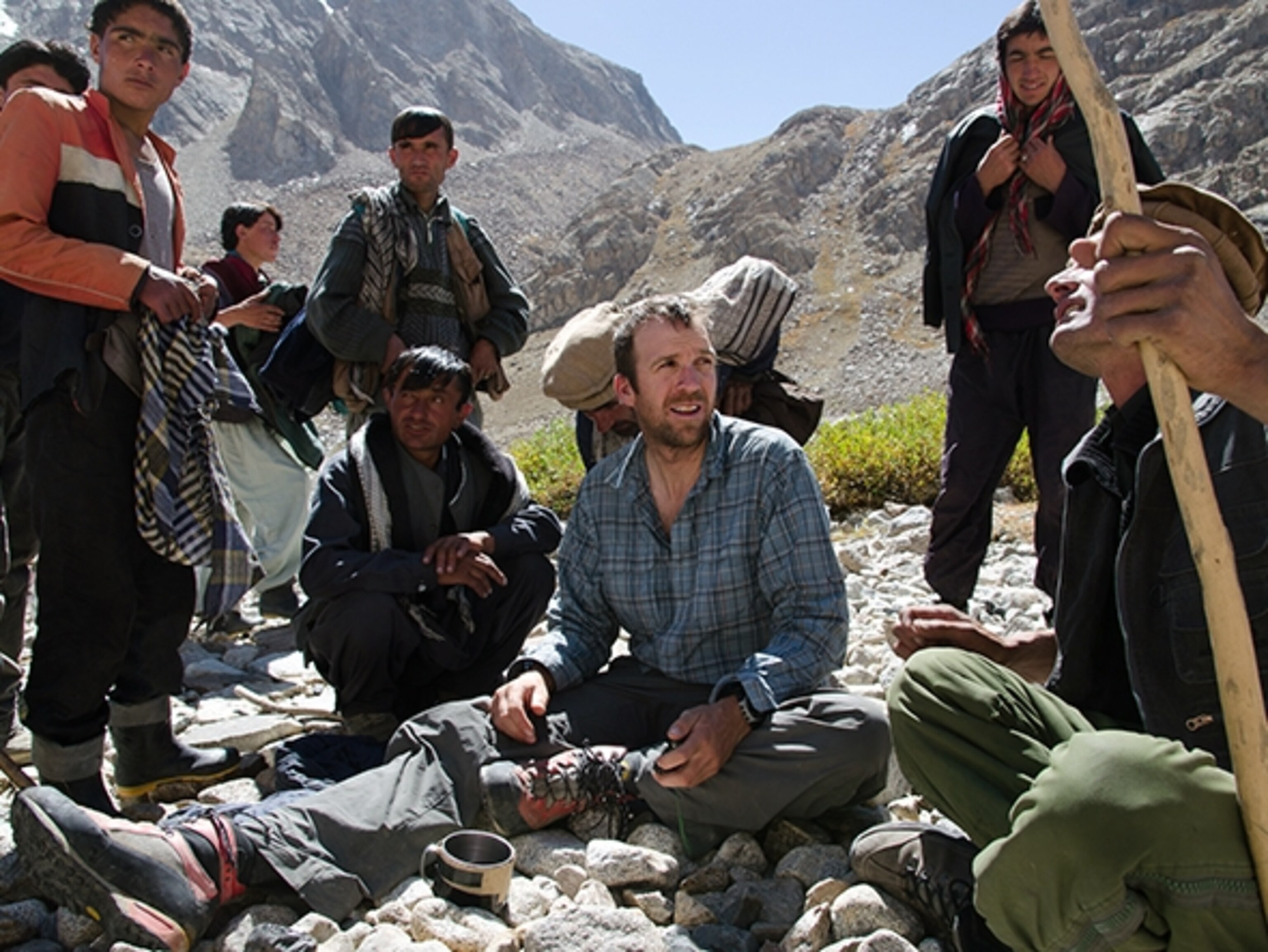 Dylan Taylor making friends with the local Afghani villagers and porters at the Issik Valley base camp; Photograph courtesy Dylan Taylor