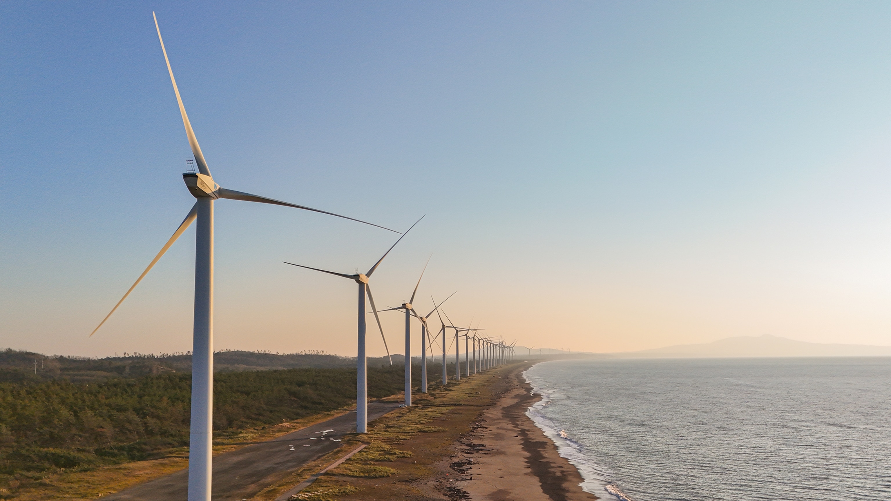 huge wind turbines at Hachiryu Wind Farm, Mitane, Japan.