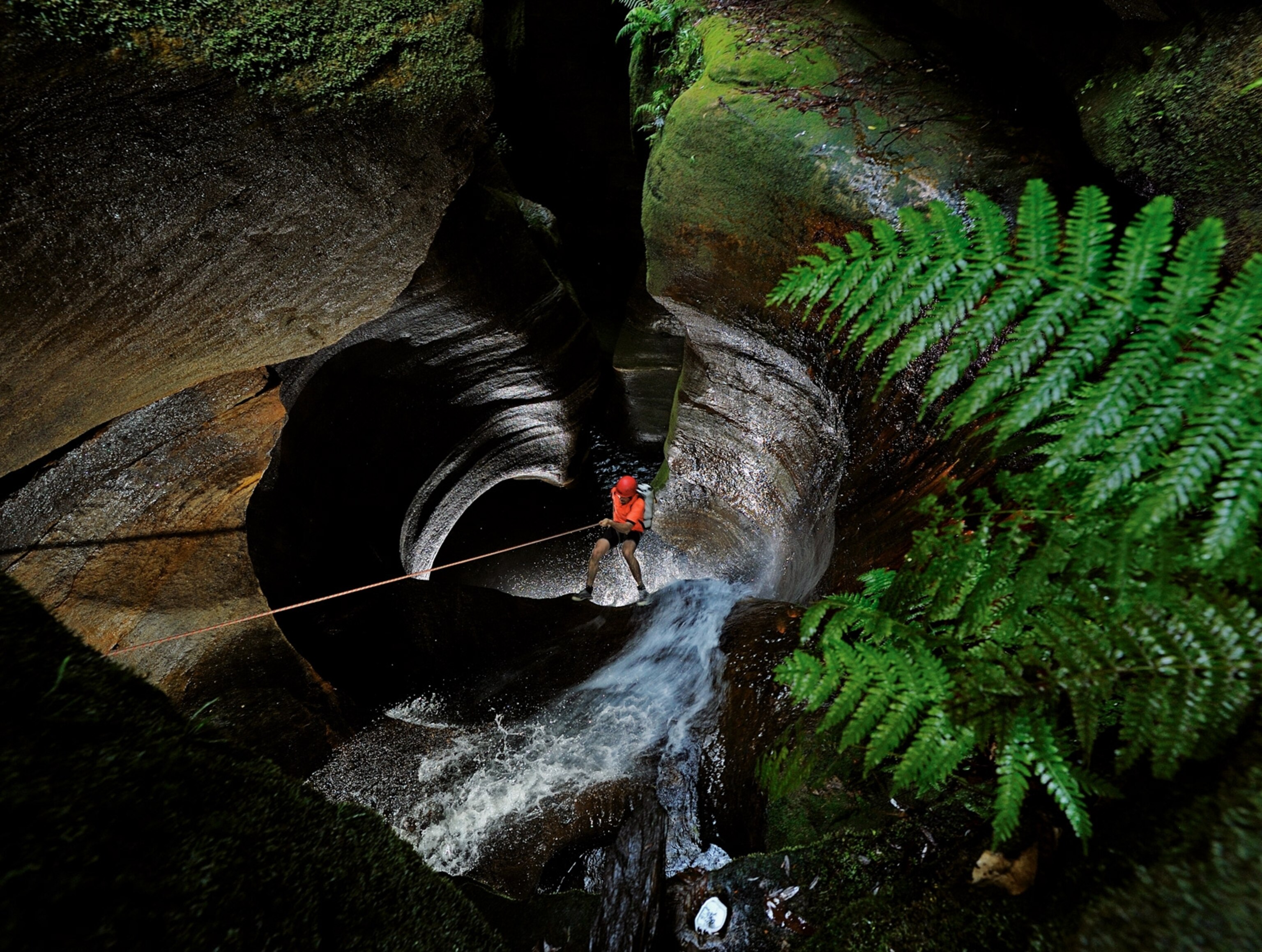 person descending into the Black Hole of Calcutta in Claustral Canyon
