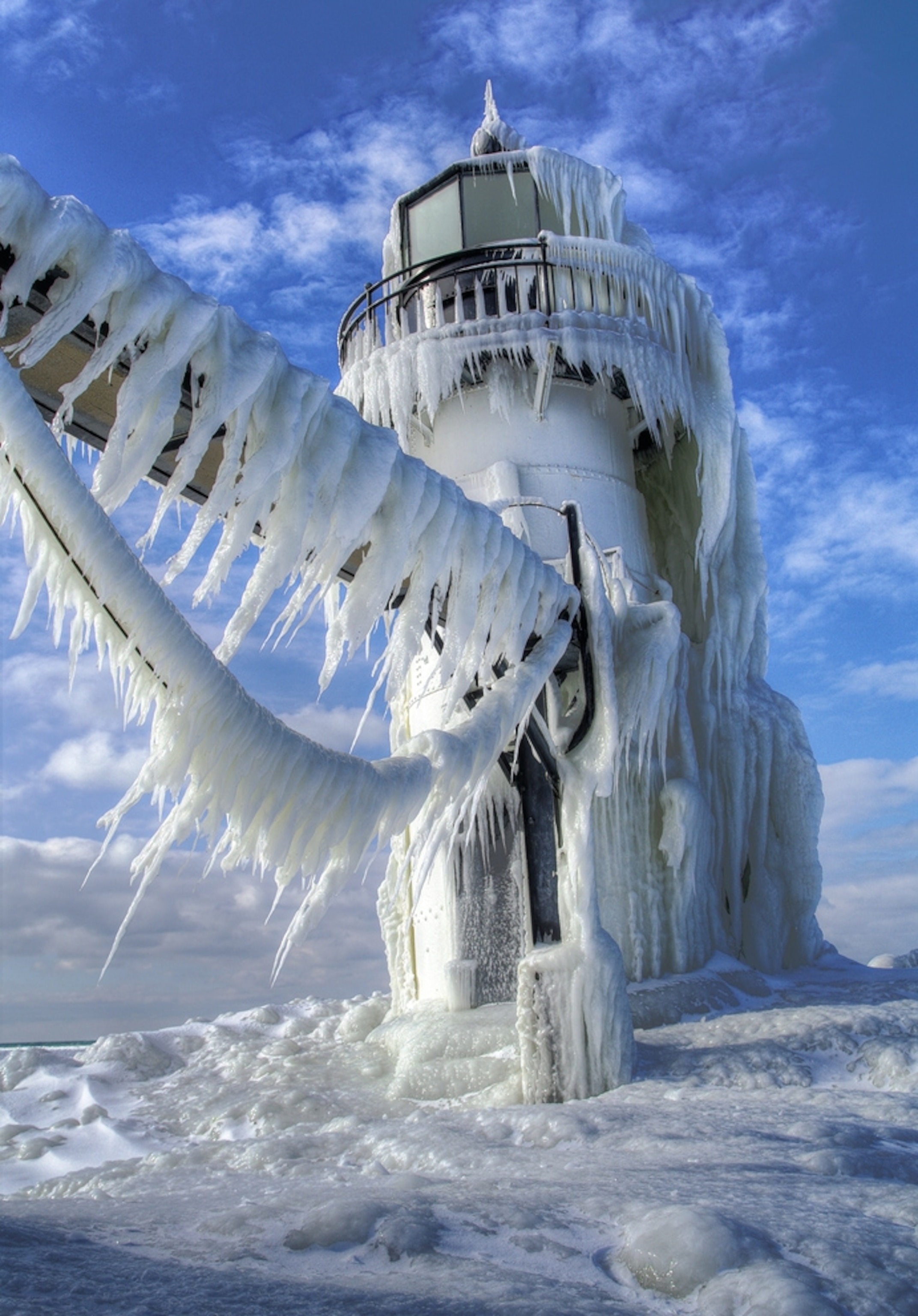 a lighthouse covered in frozen freshwater spray, St. Joseph, Michigan