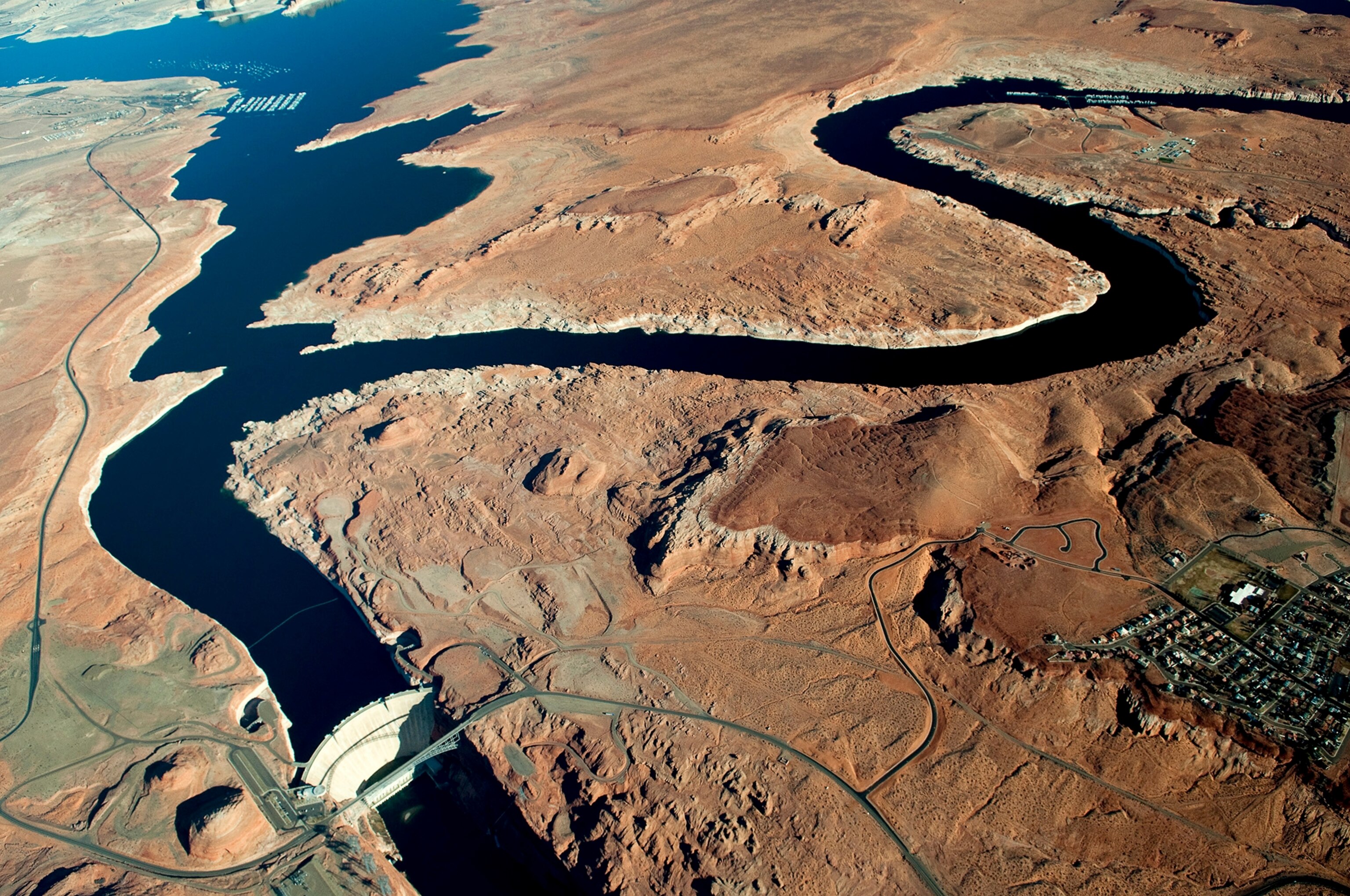 A boat traces the curves of Reflection Canyon, part of Glen Canyon.