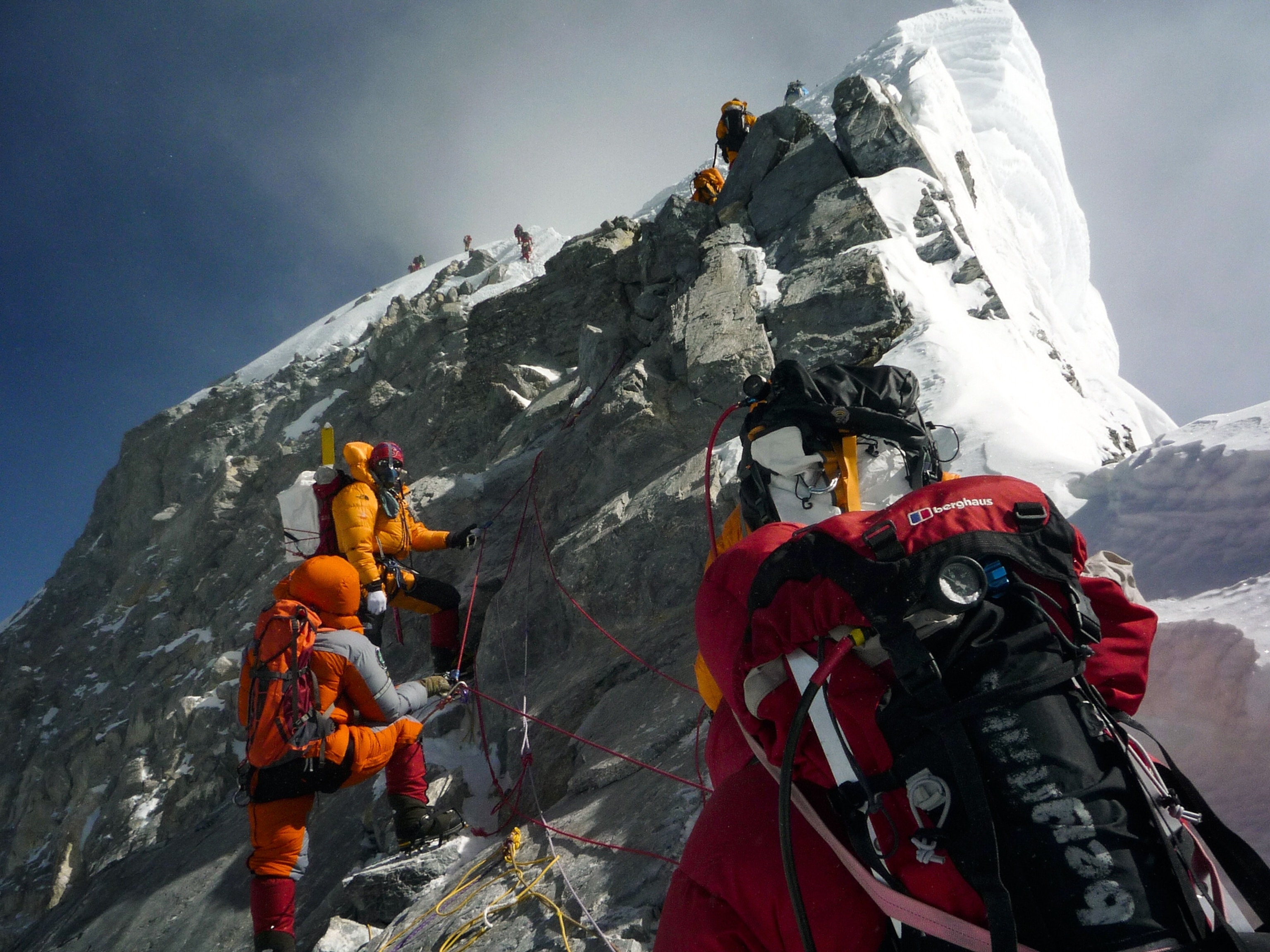 Mountaineers at the Hillary Step on Mount Everest.