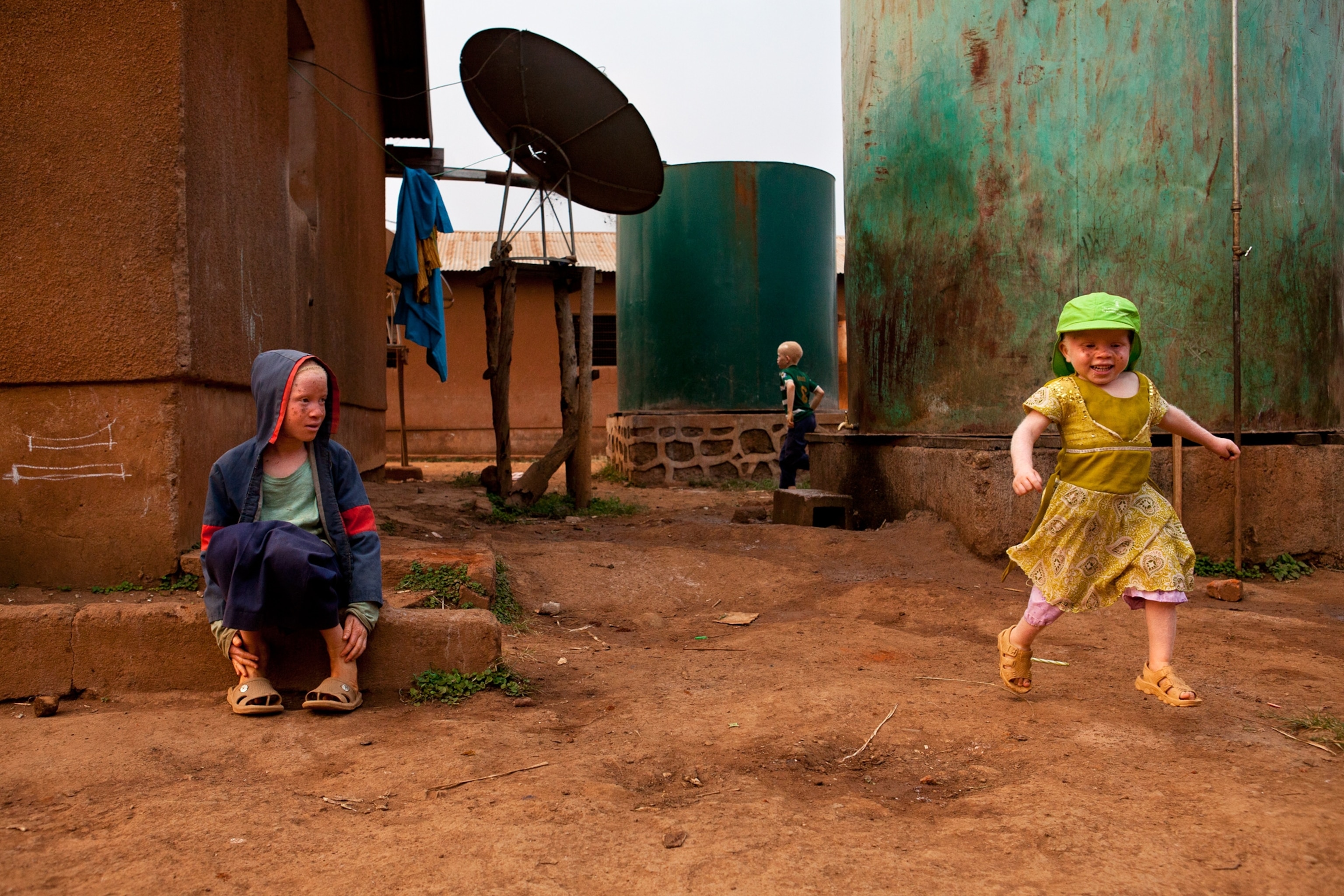 children playing outside at the Kabanga Protectorate Center compound, Tanzania