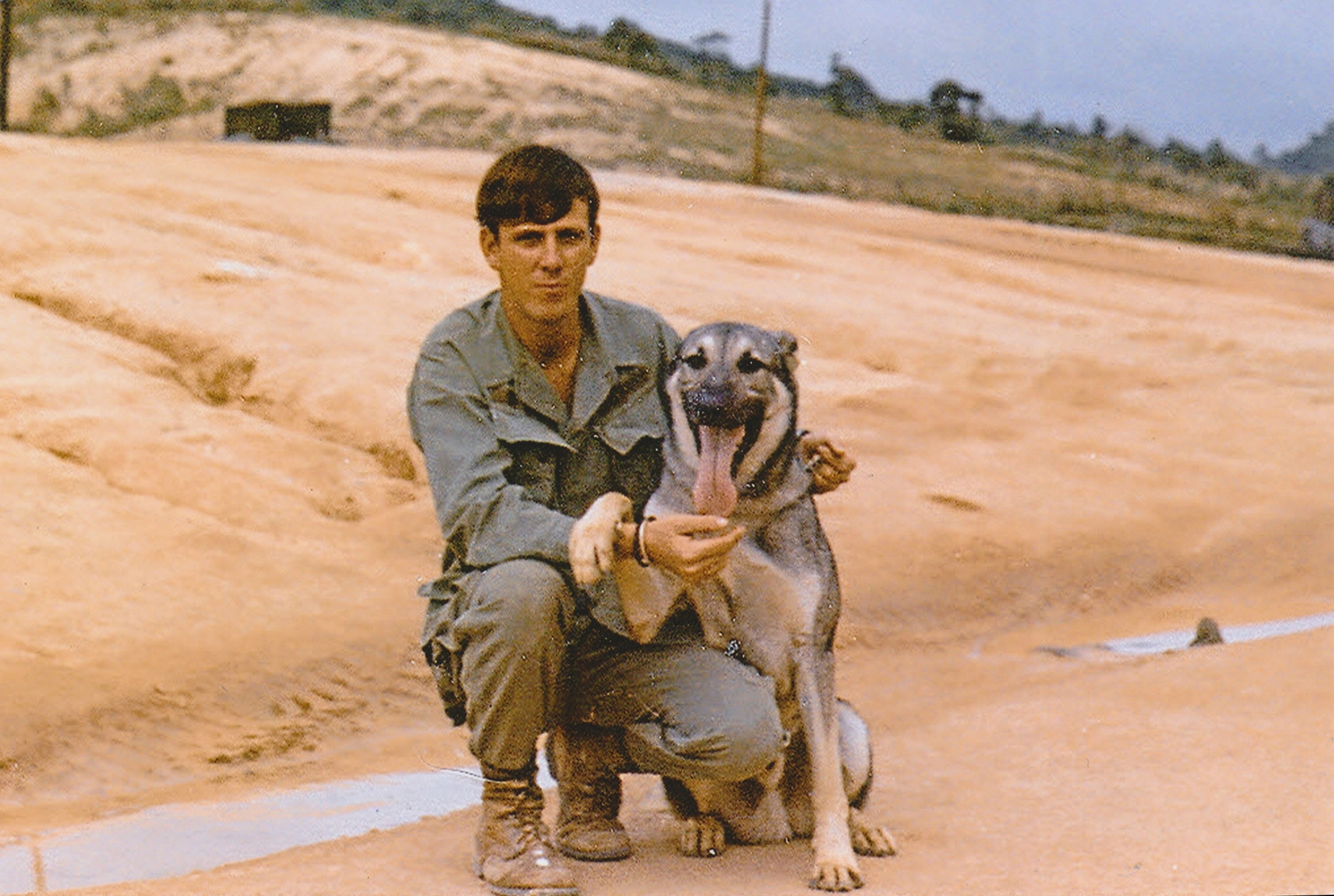 a scout-dog handler from Vietnam with his dog