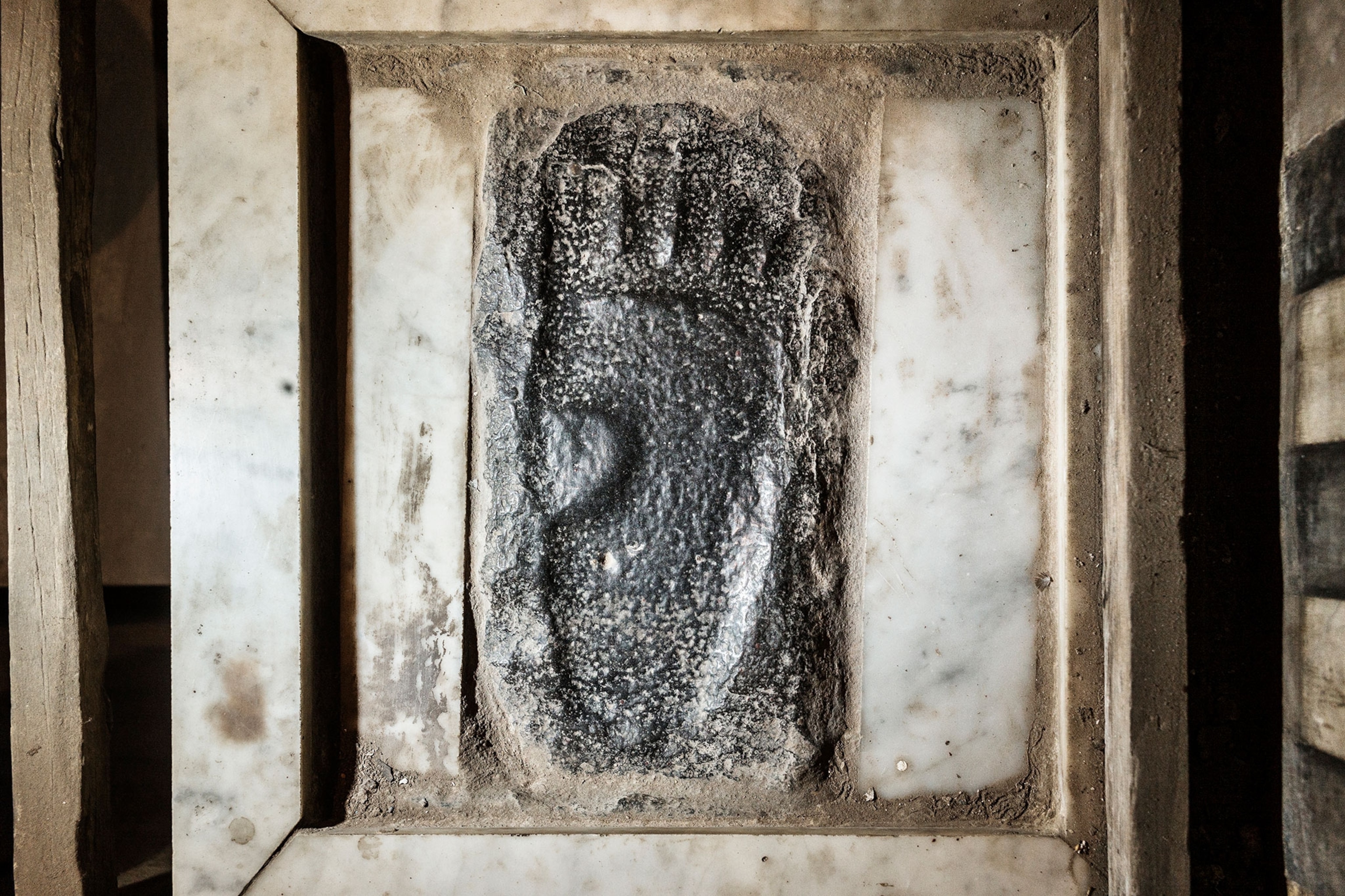 behind a locked door of the Sultan Quyitbay mosque is a footprint of the Prophet Mohamed