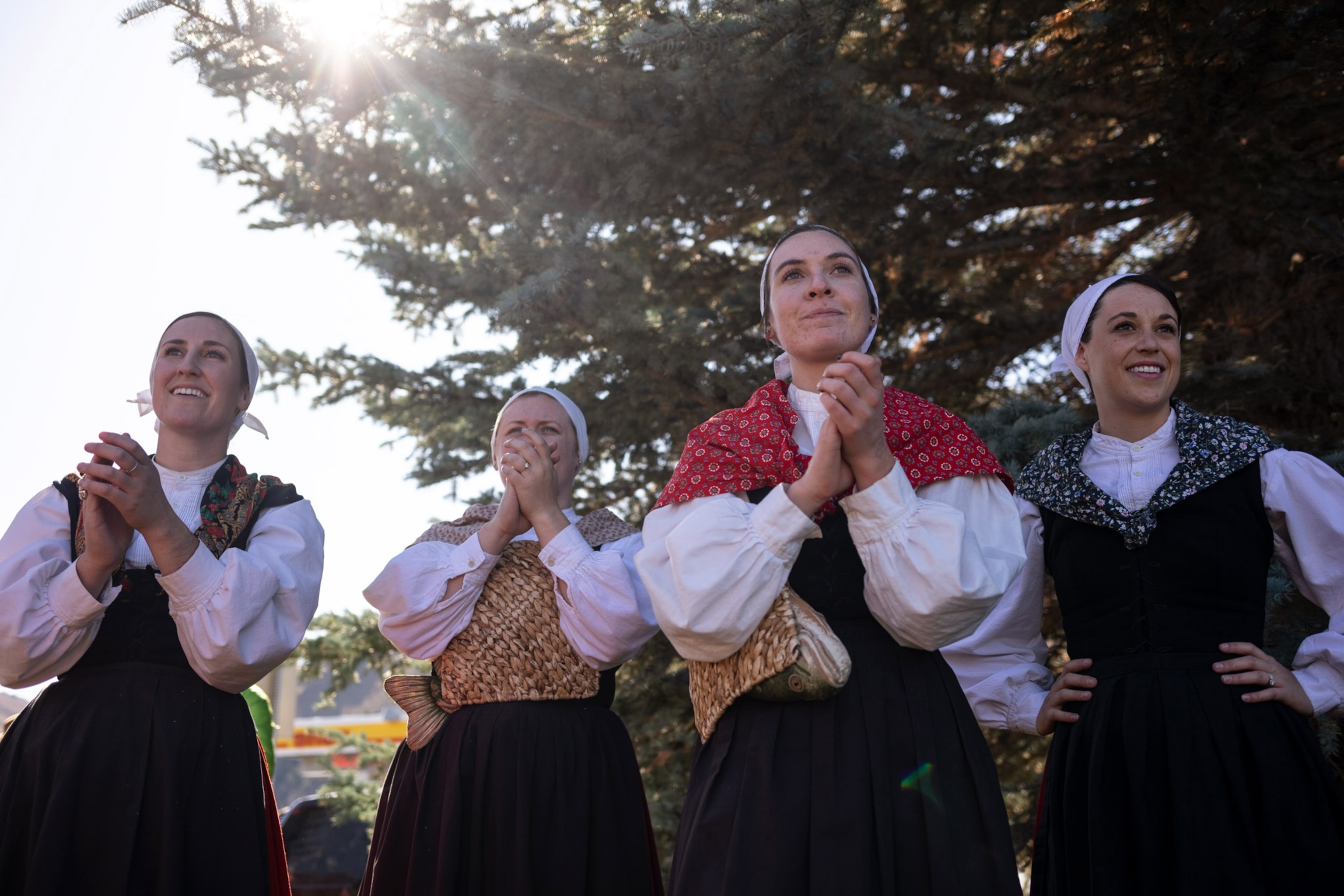 women dressed in traditional Basque costumes at the Trailing of the Sheep Festival