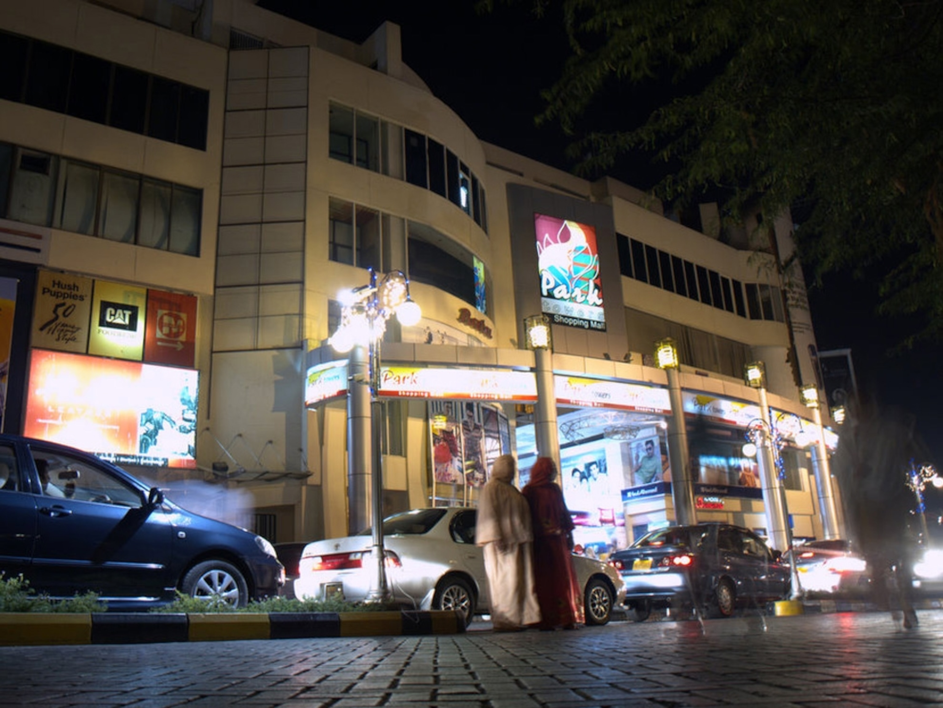 Shopping mall in Pakistan stays open well in the evening after many others have closed. (Photography by Mason Inman/for National Geographic)