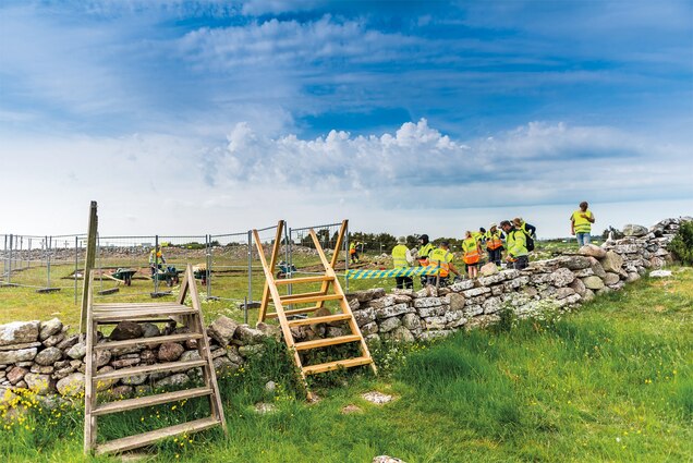 Archaeologists work at the Sandby Borg site on &Ouml;land, Sweden. As of 2018 a little under a 10th of the interior of the ring fort had been excavated.
