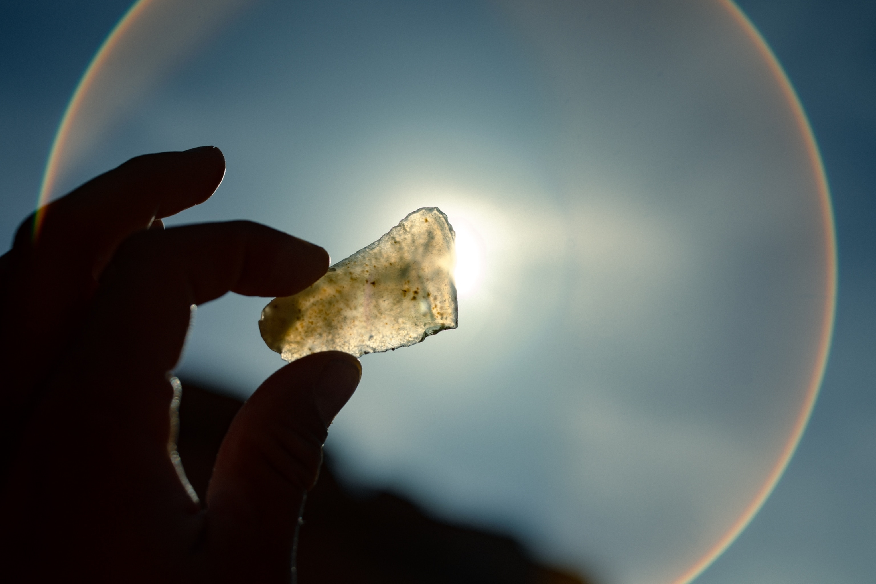 Stone found in Glen Canyon held up to the sun