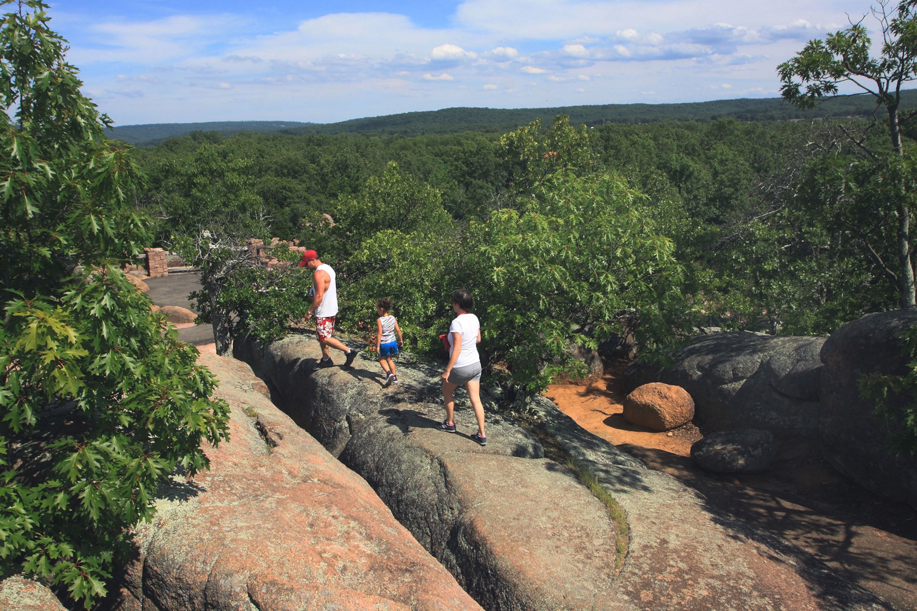hiker in Elephant Rocks State Park, Missouri