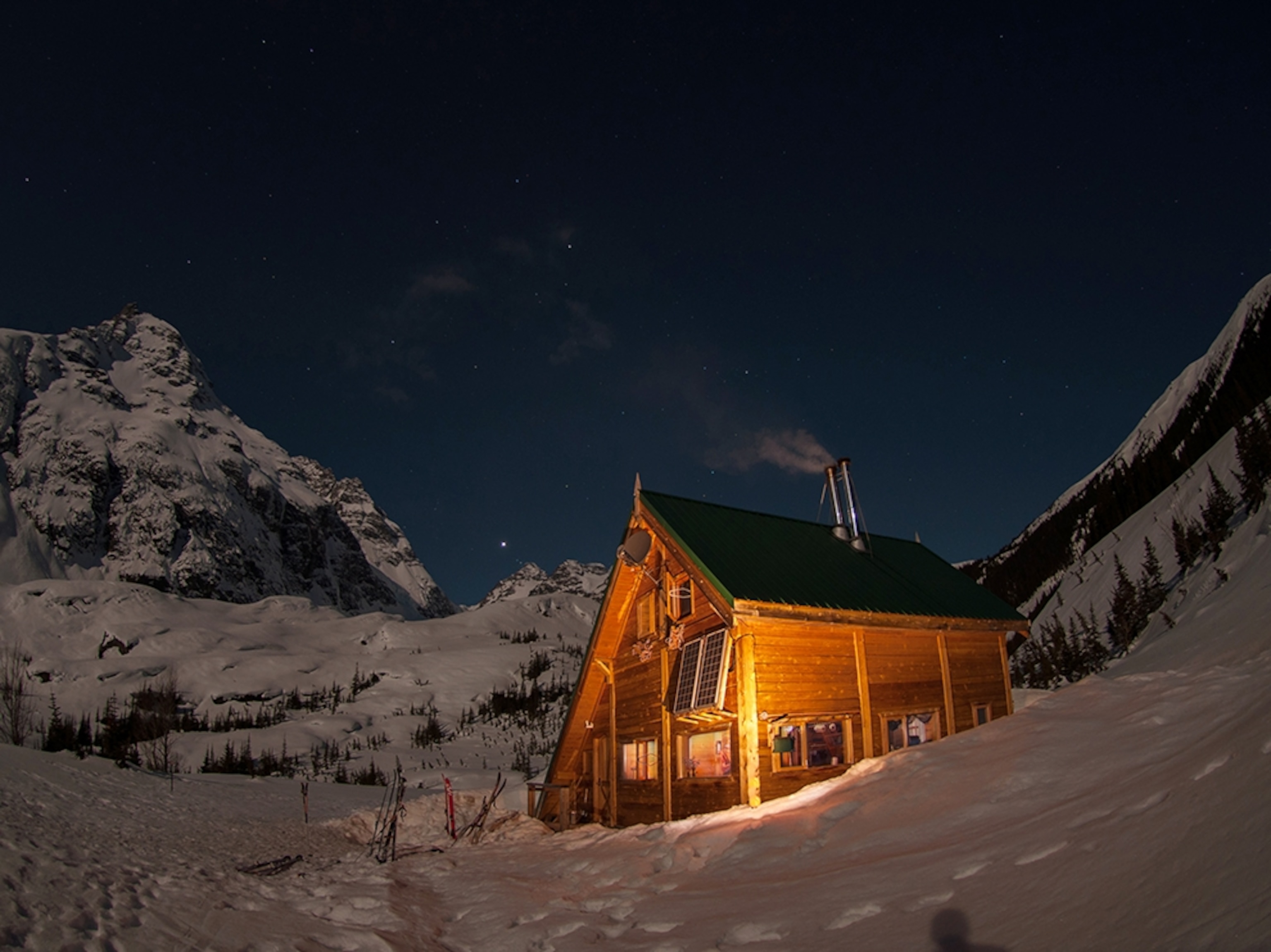 a ski cabin at night near Burnie Glacier Chalet, Smithers, British Columbia