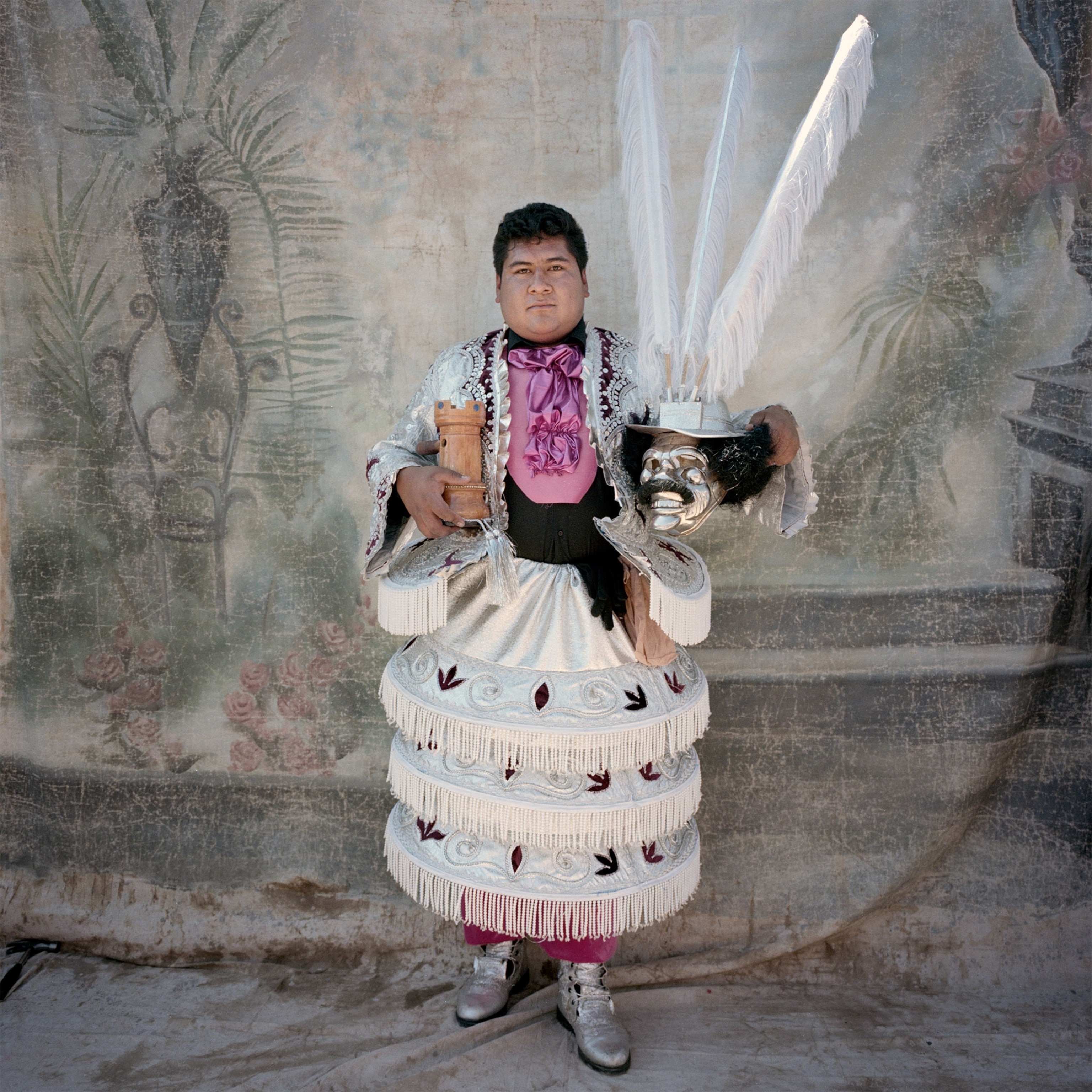 a man in a costume during the Candelaria Festival in Peru