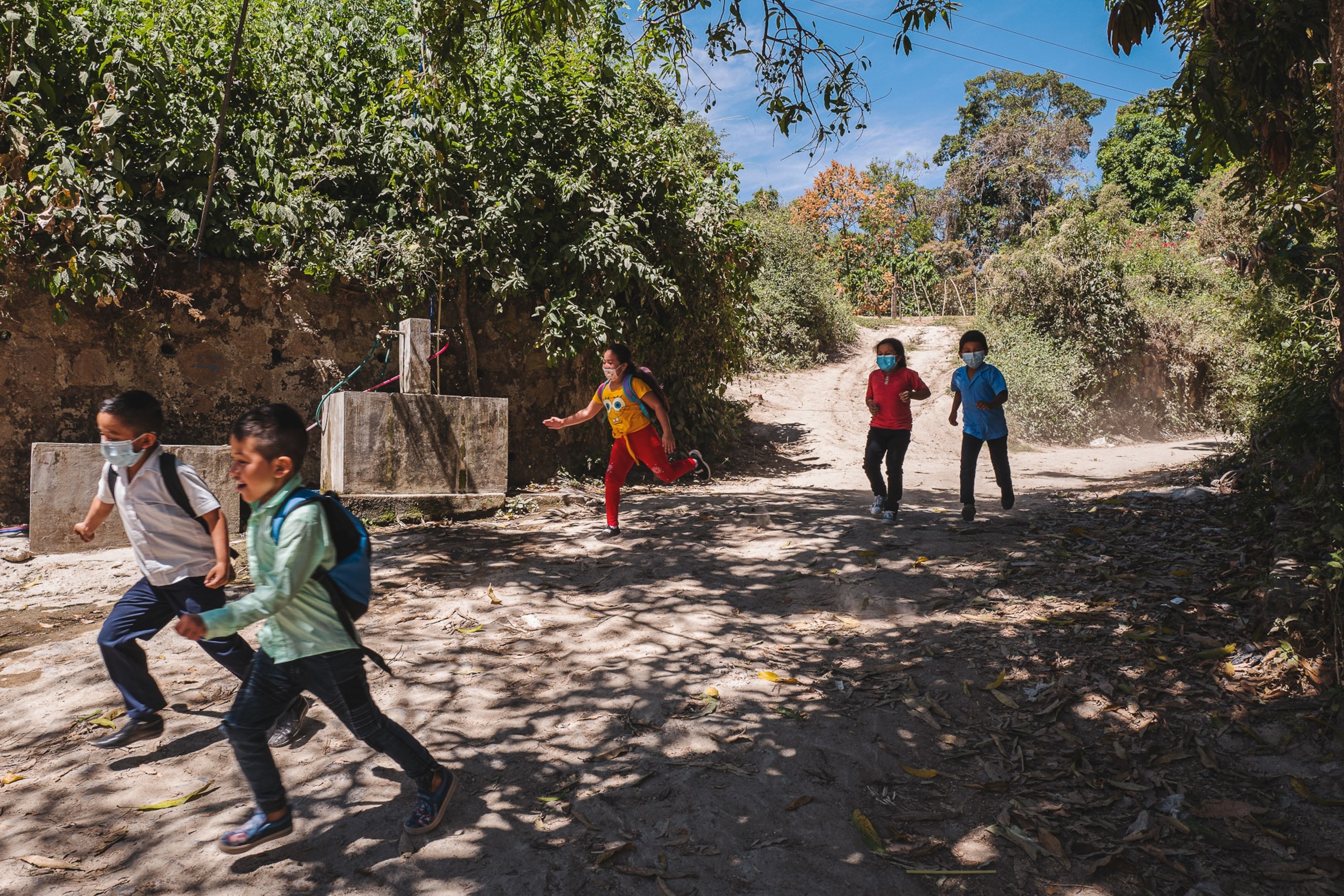 children run near a cantera after school