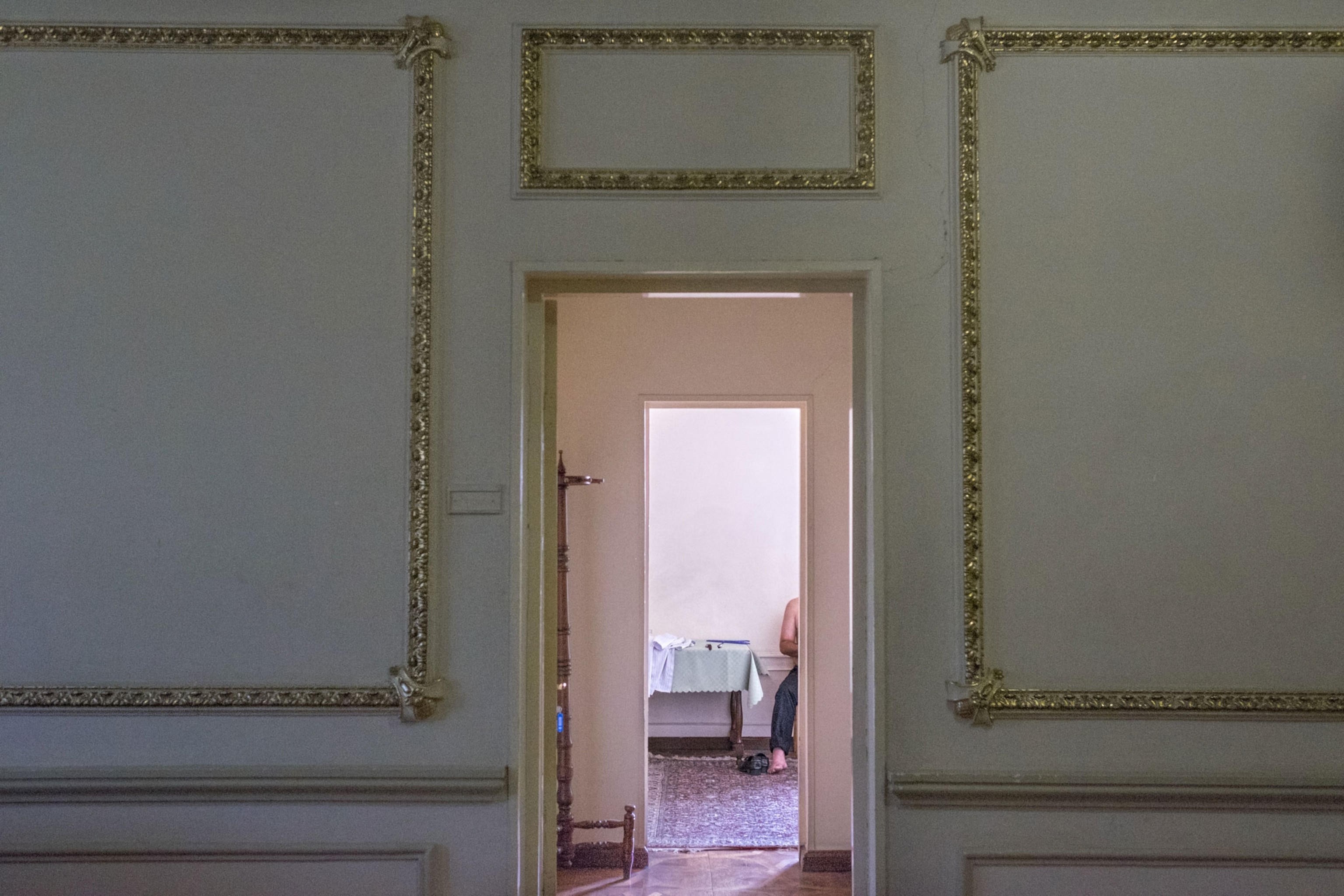 a guest of Hotel Georgia sits in his room
