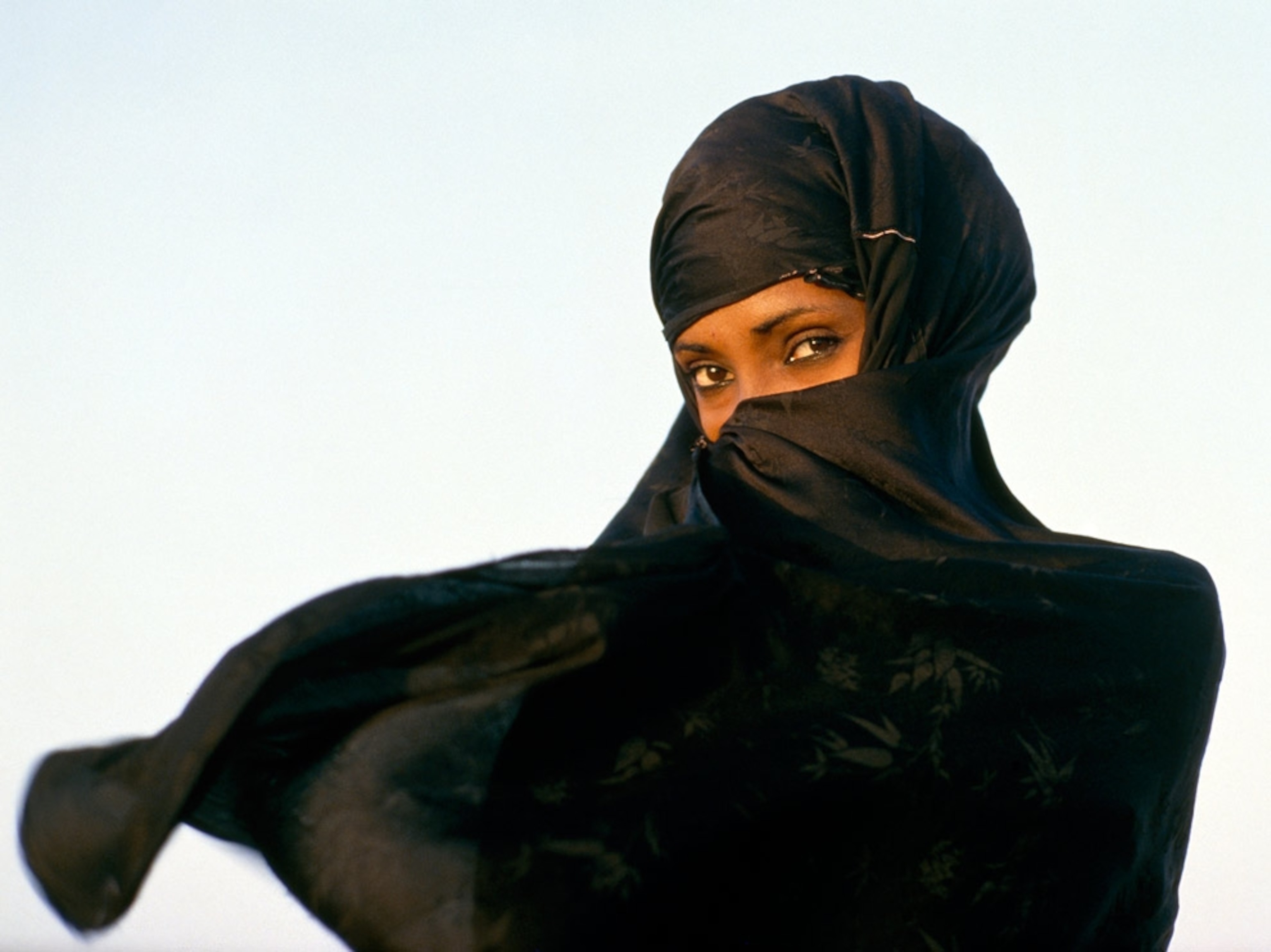 A woman in a black veil