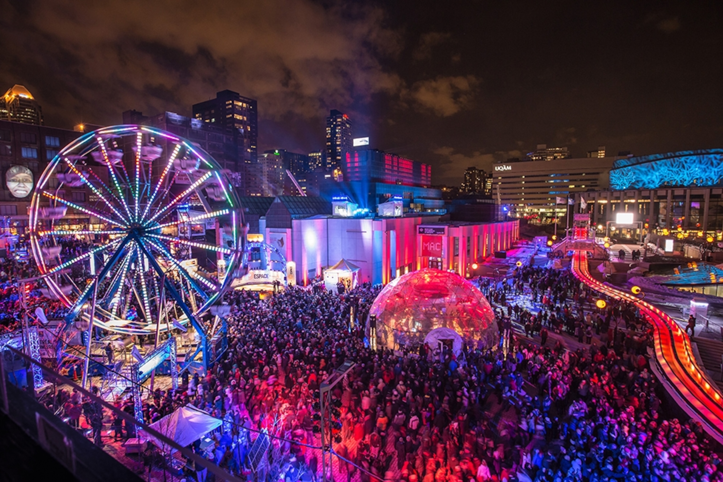 a ferris wheel and lights at Montréal En Lumière