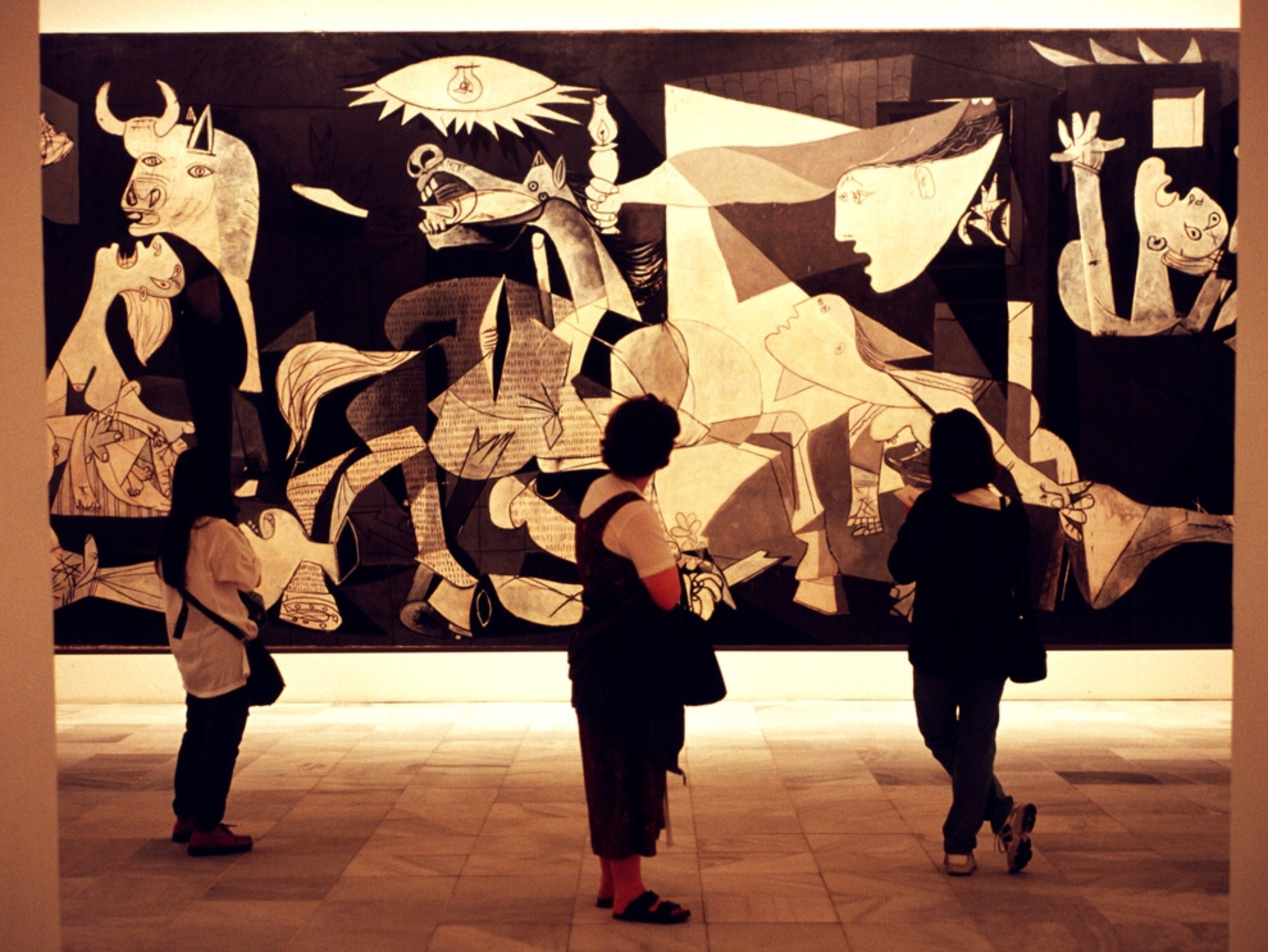 People viewing Pablo Picasso's Guernica