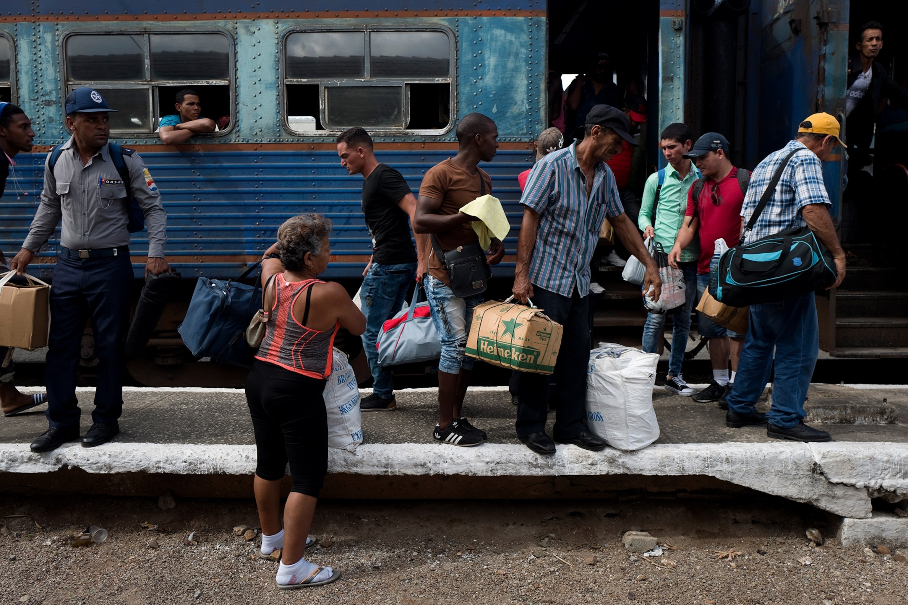 passengers on a train in Cuba