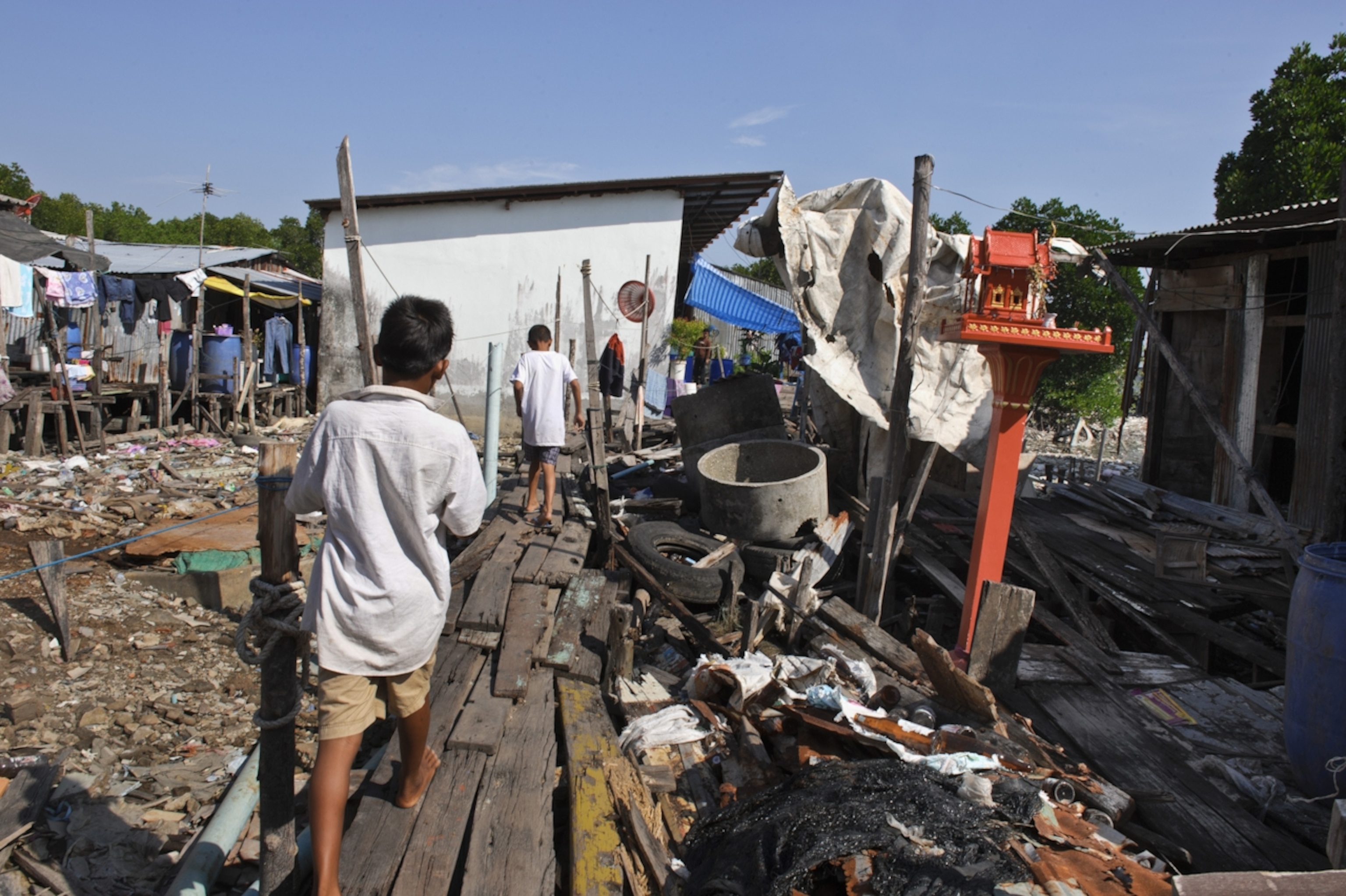 Most of the Burmese are not allowed refugee status and live in abysmal conditions at Rashada Pier on Phuket. They must pay about $150 a month to these slum owners as well as monthly bribes to the police just to live here.