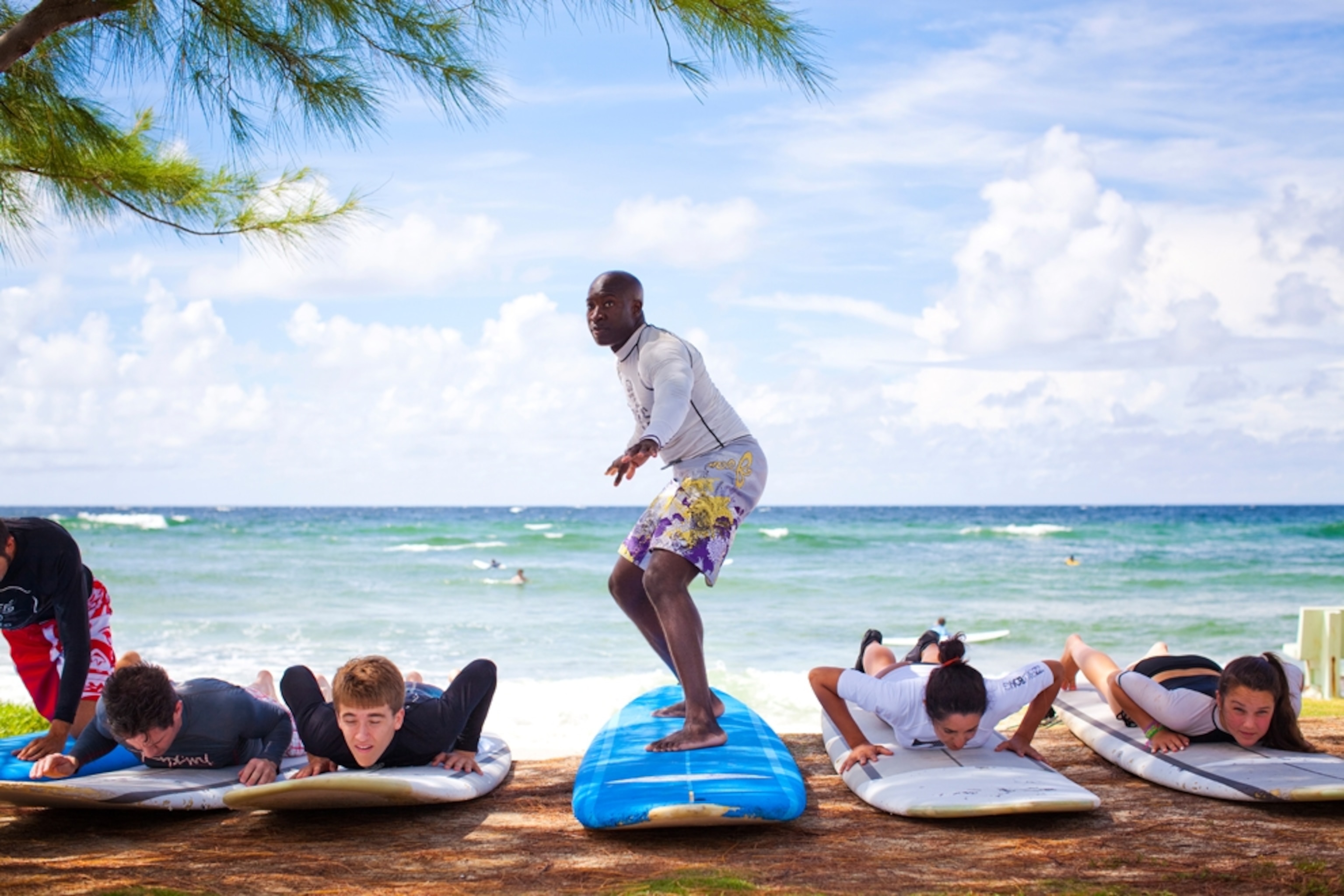 a group during a surfing lesson in Barbados