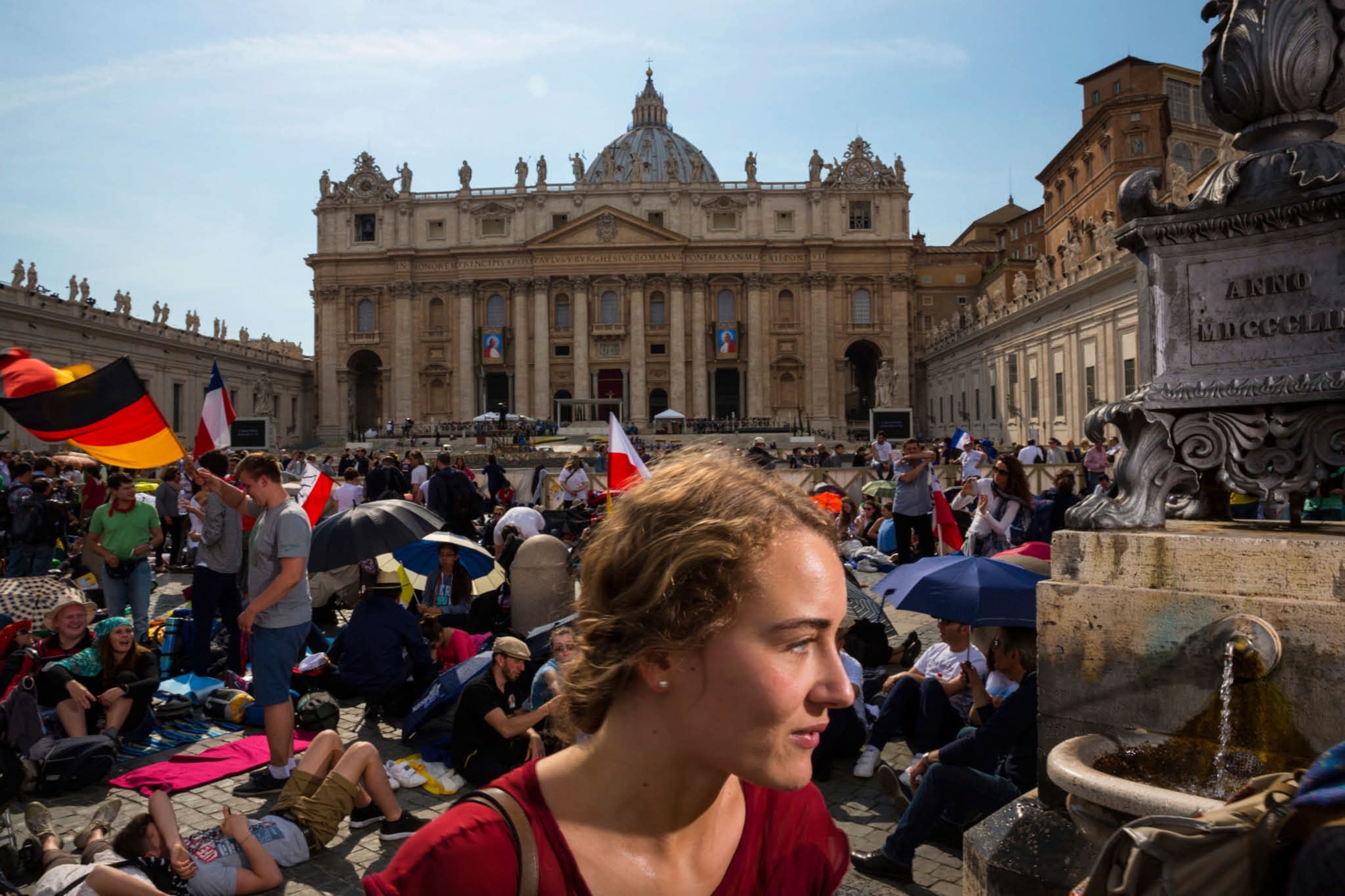 a girl waiting to see the Pope