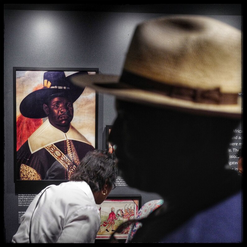 Museumgoers seemed surprised to learn about all the contributions from people of African descent because as they said, it is not taught in their history books. A portrait of Dom Miguel de Castro, the diplomat of Congo, is seen in the background. He was sent on diplomatic missions around the world, which were proof of the role African rulers played in the Atlantic trade network.